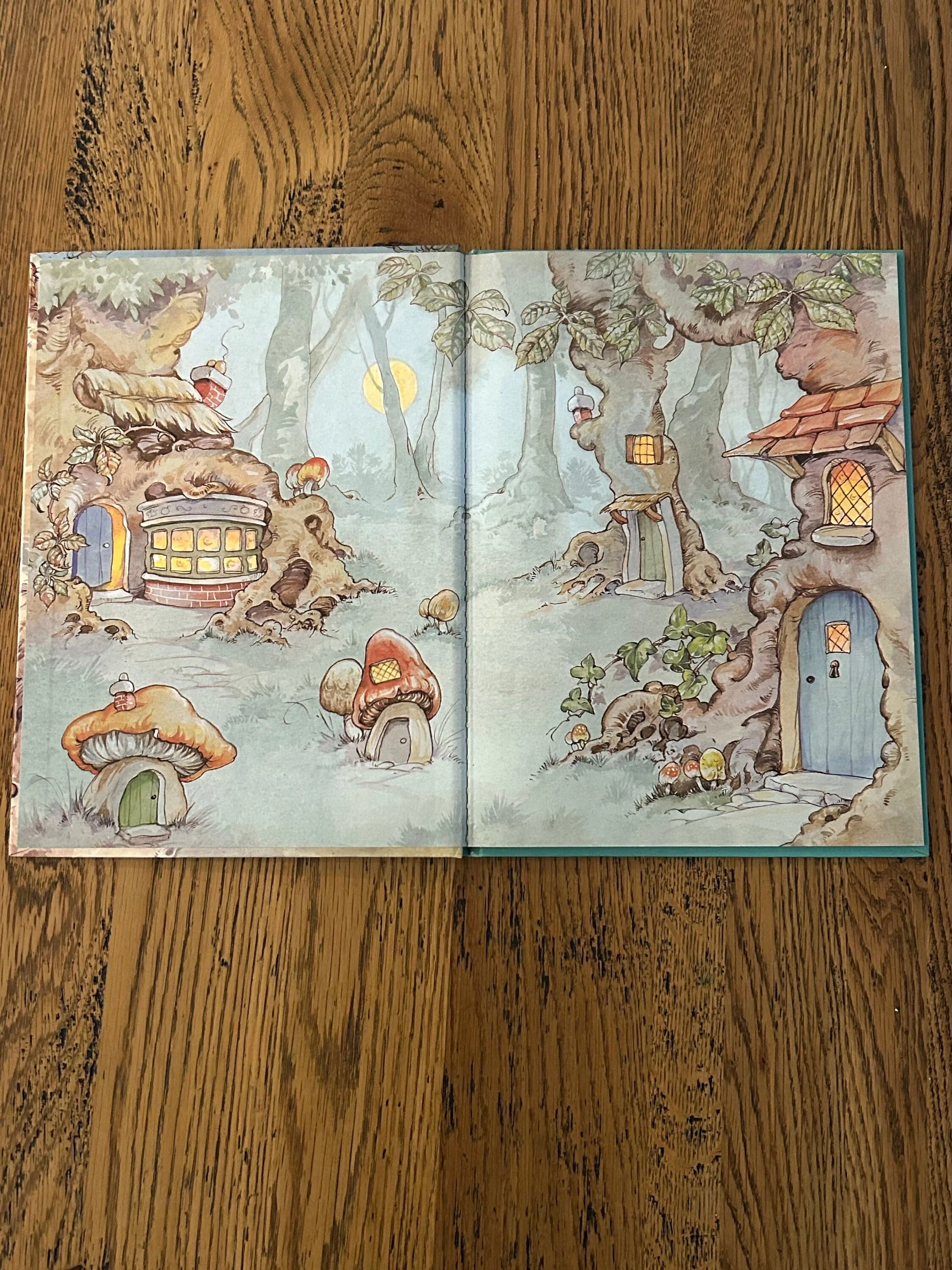 Endpaper illustration showing full scene of Oaktree Wood homes in tree trunks