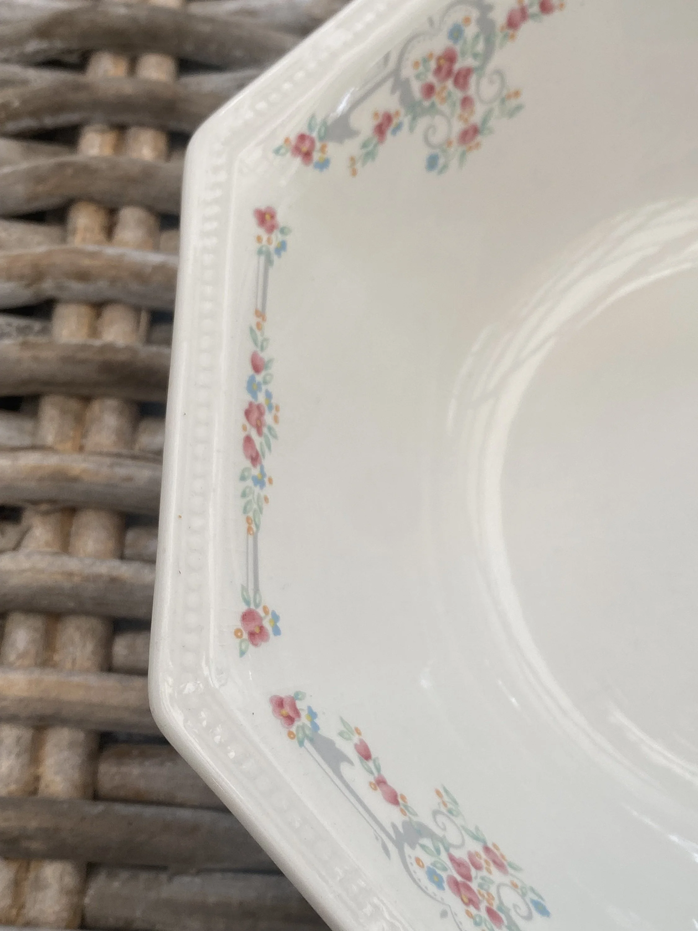 Corner floral detail showing soft colours and fine lines