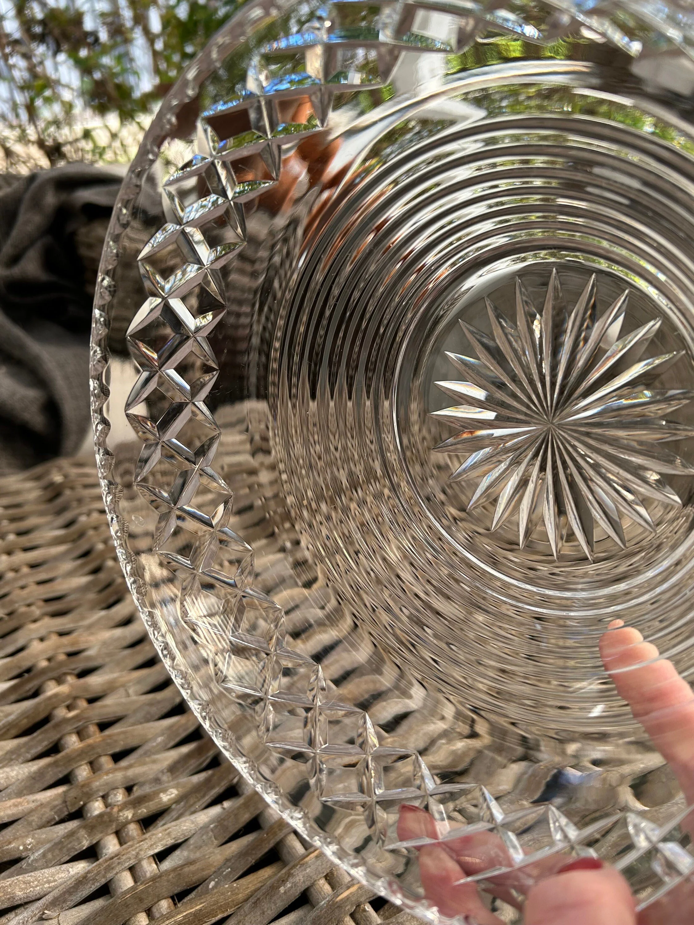 Close-up of bowl interior and rim showing crisp cut crystal detail and geometric pattern