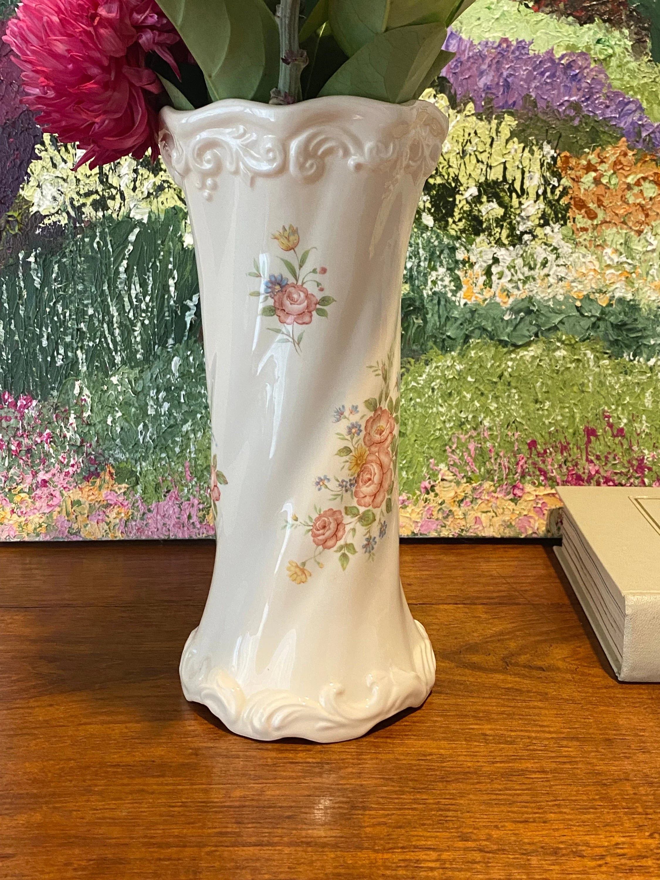 Full view of Grizelle porcelain vase against decorative background