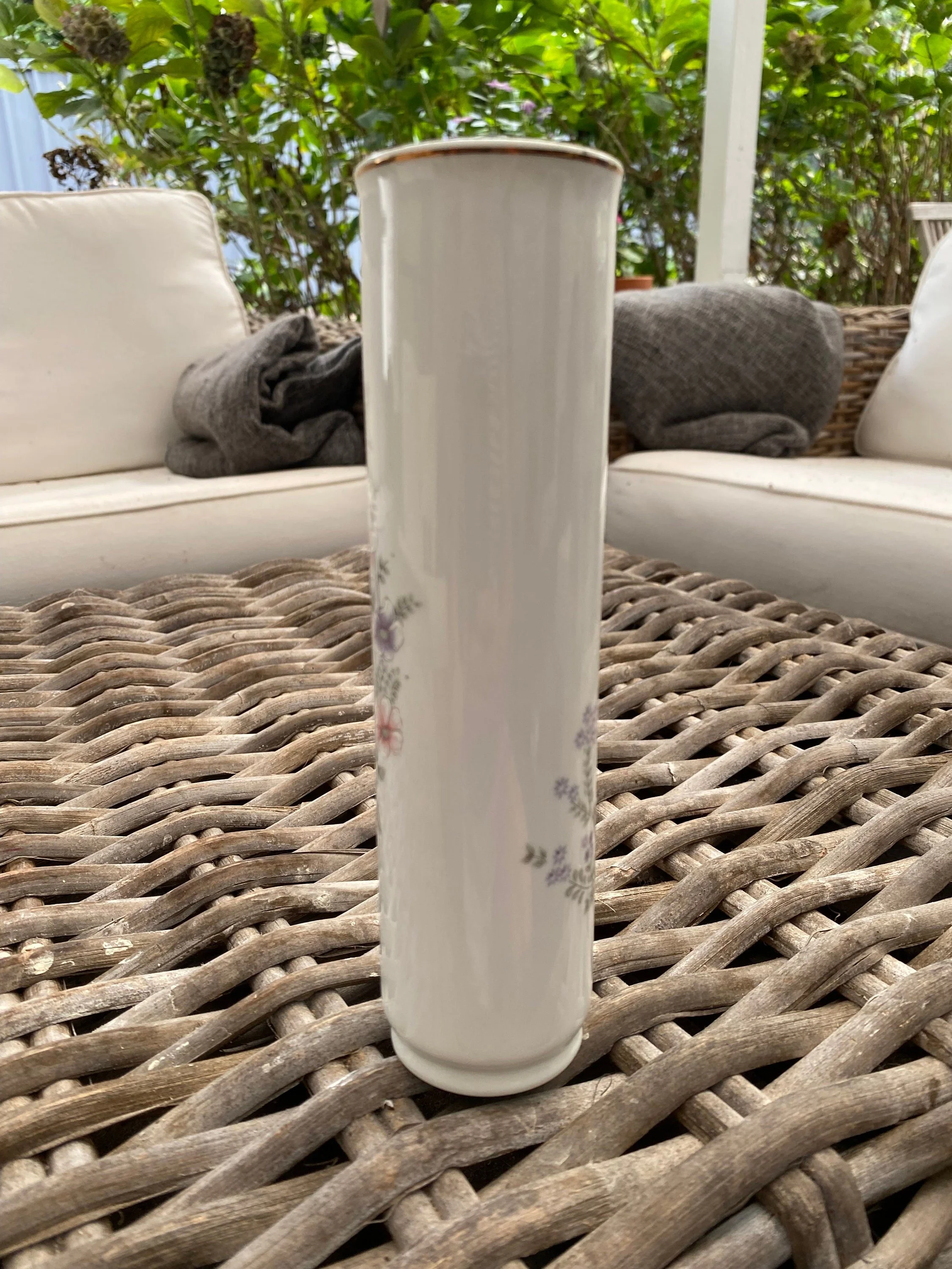 Rear view showing soft glazed finish and floral continuation