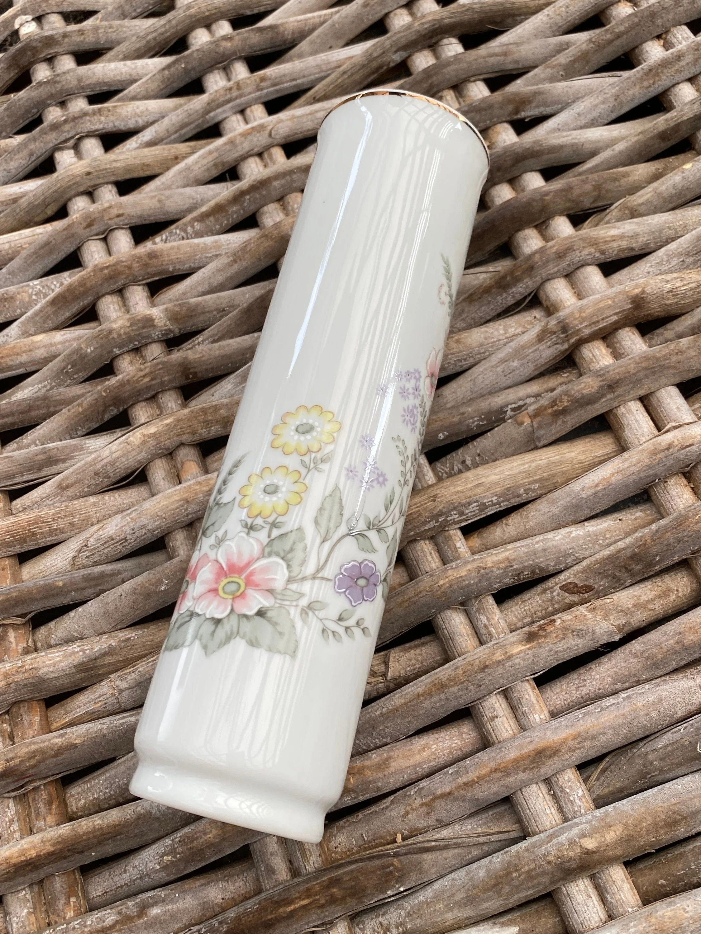 Flat-lay angle showing subtle curvature of vase design