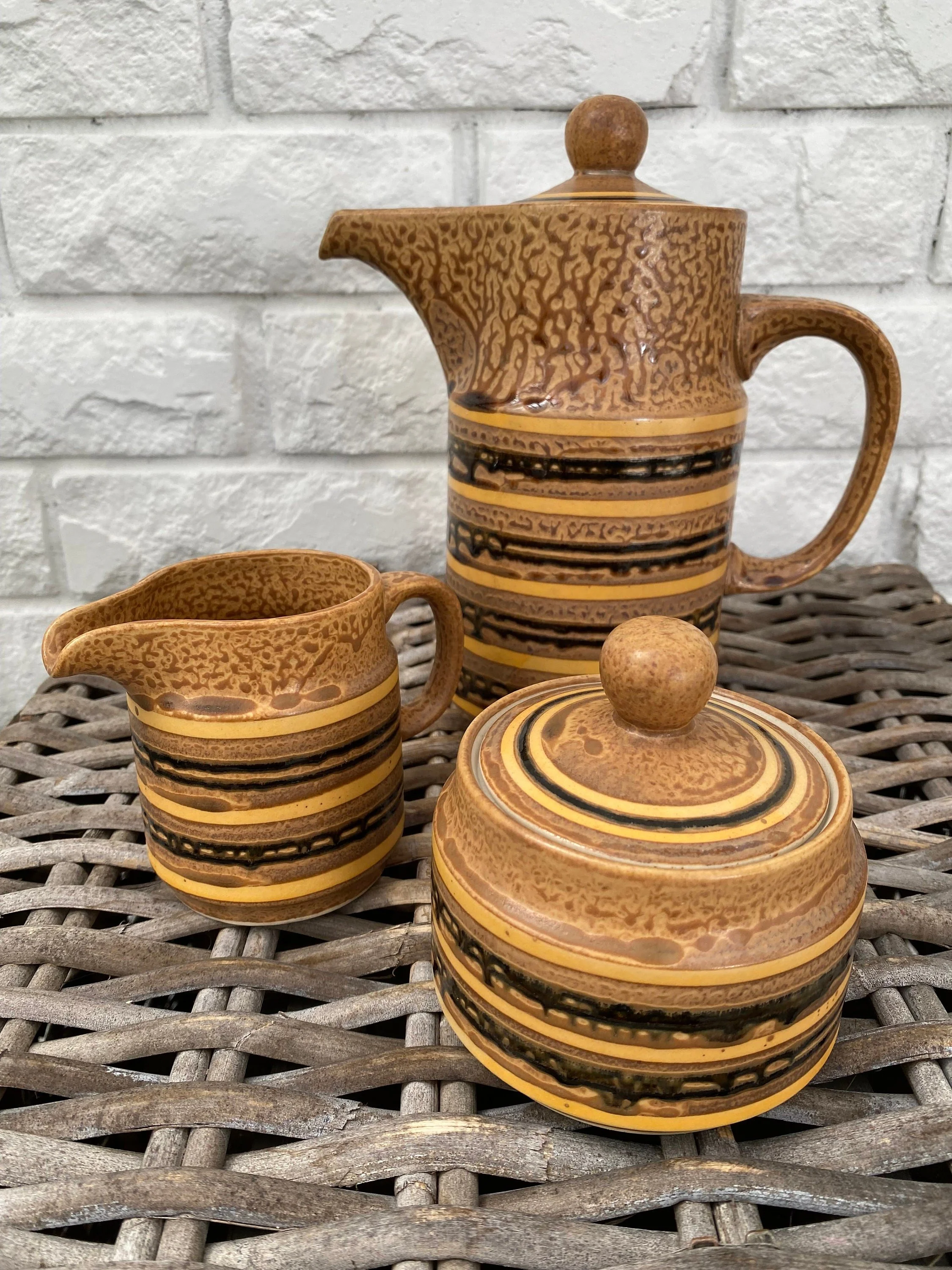 Coffee jug, creamer, and sugar pot displayed together