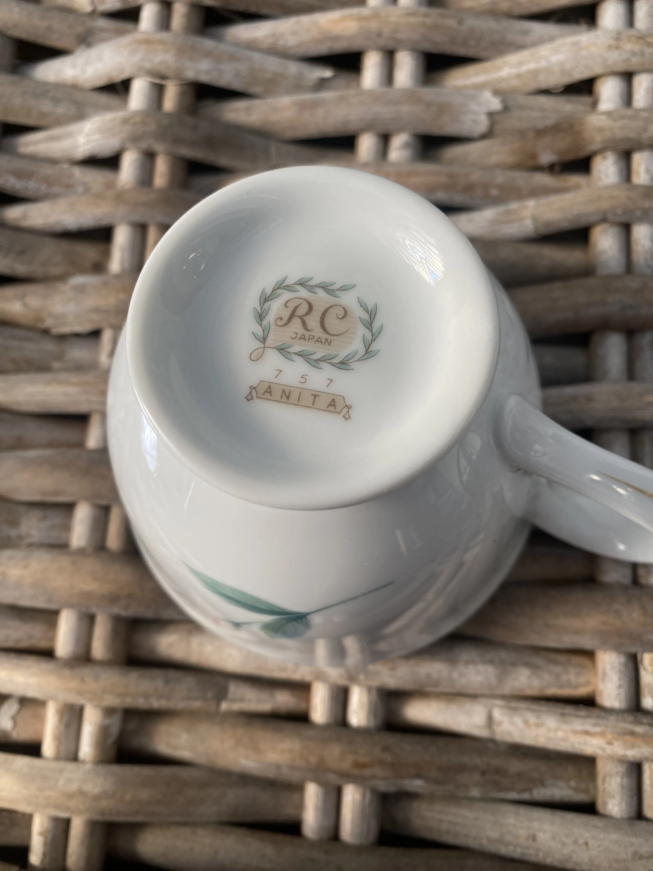 Top-down view into teacup showing smooth white interior