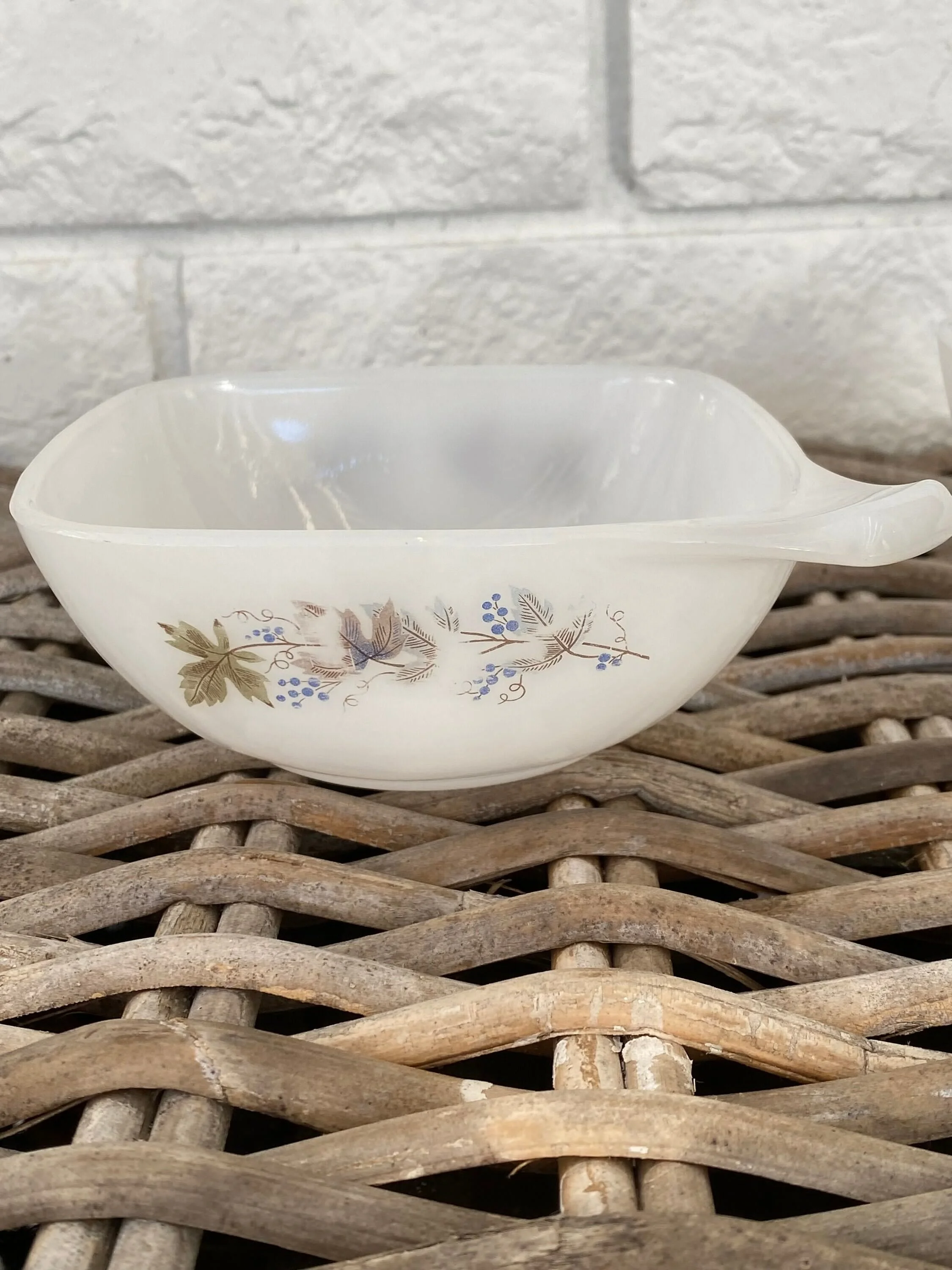 Opposite side angle showing handle and faded detail