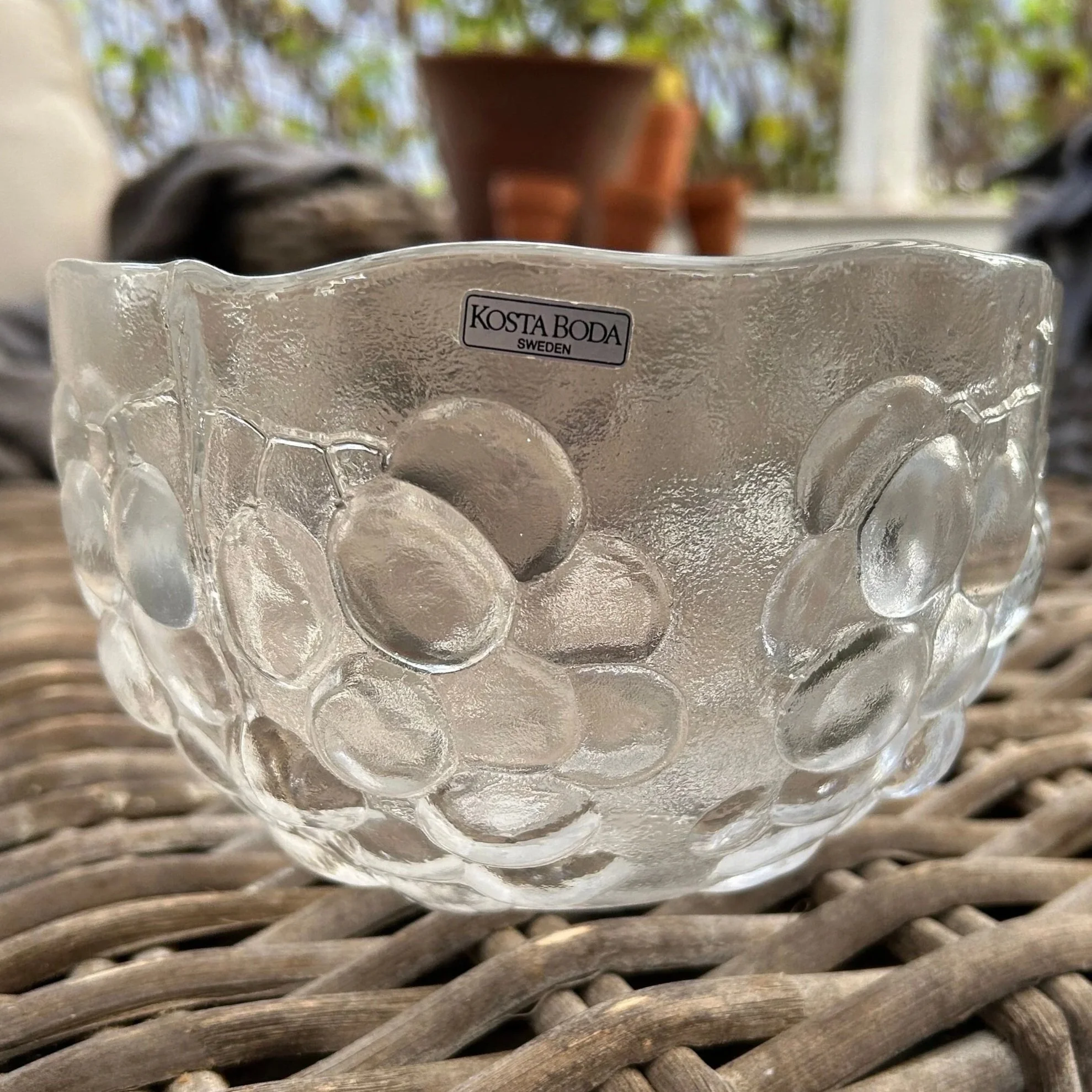 Side view of Kosta Boda ‘Kosgrap’ bowl showing grape texture and sticker