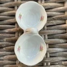 Top-down view showing both dishes with rose details