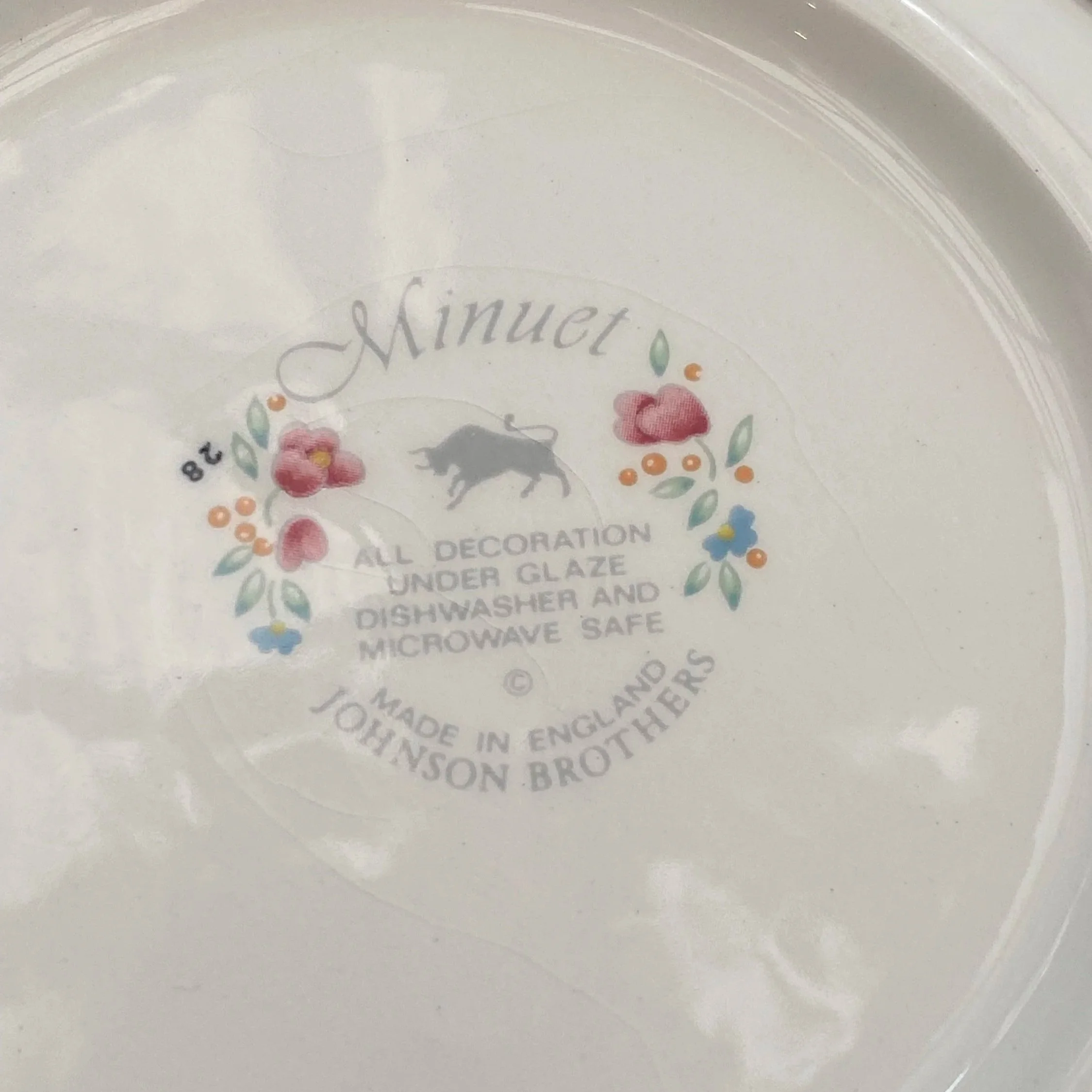 Close-up of Johnson Brothers ‘Minuet’ backstamp with floral detail