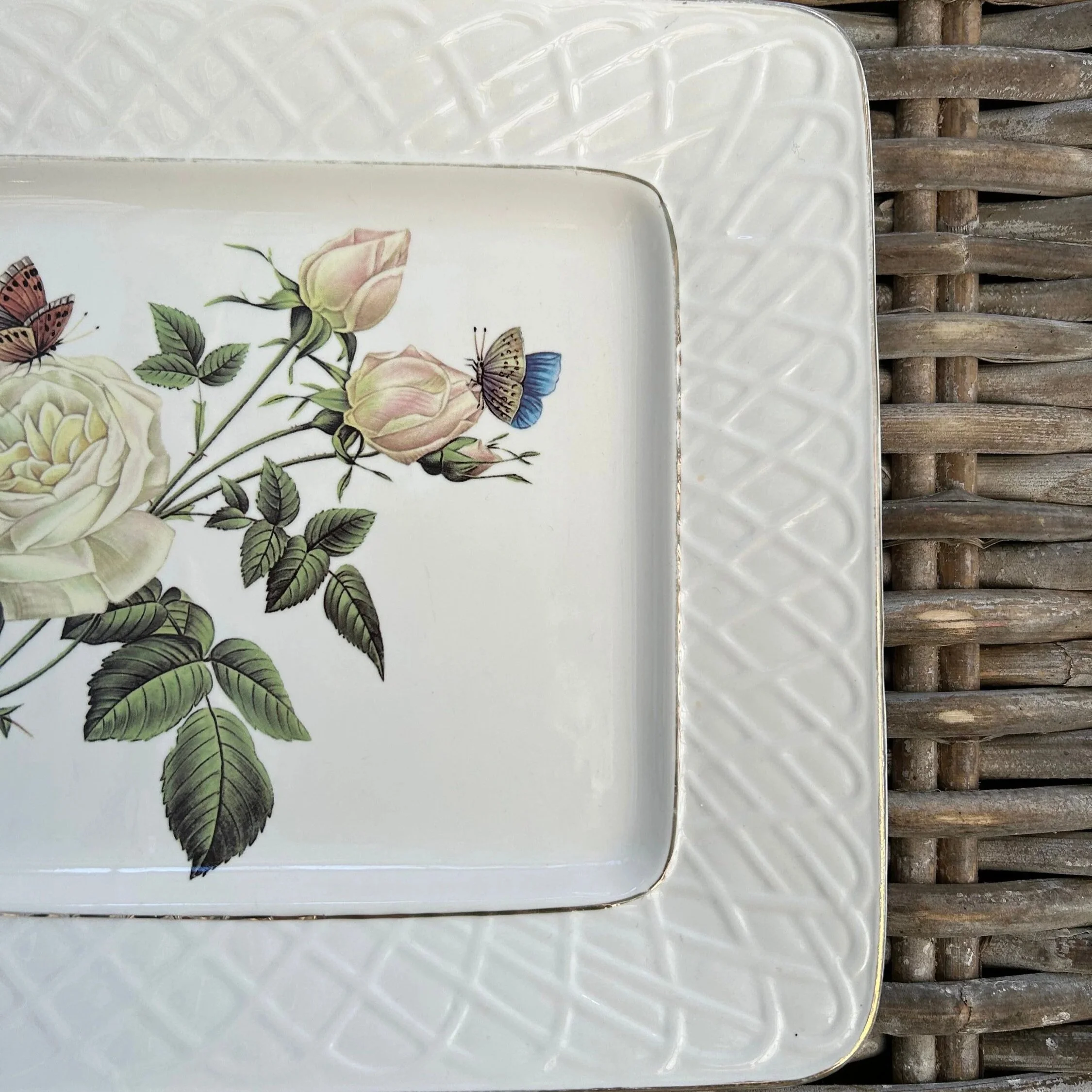 Centre view of roses and butterflies with visible brushstroke detailing