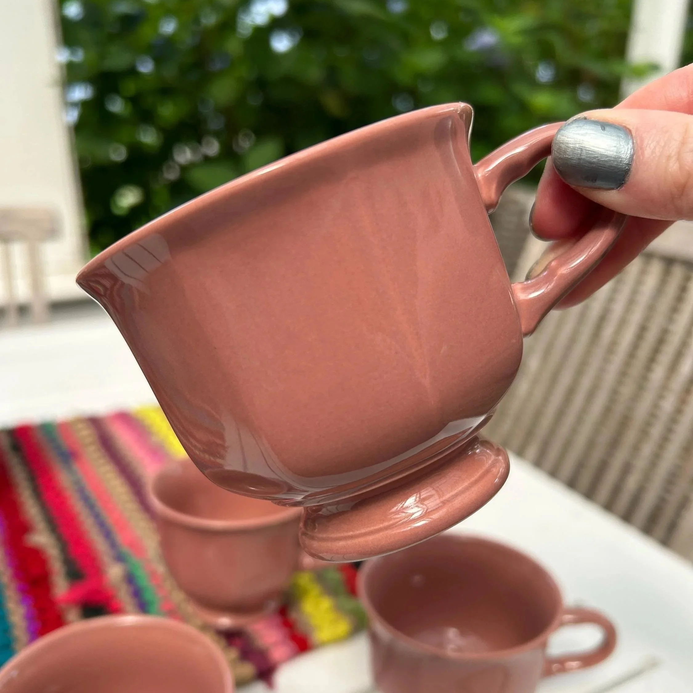 Close-up of a single cup – showing octagonal shape and footed base
