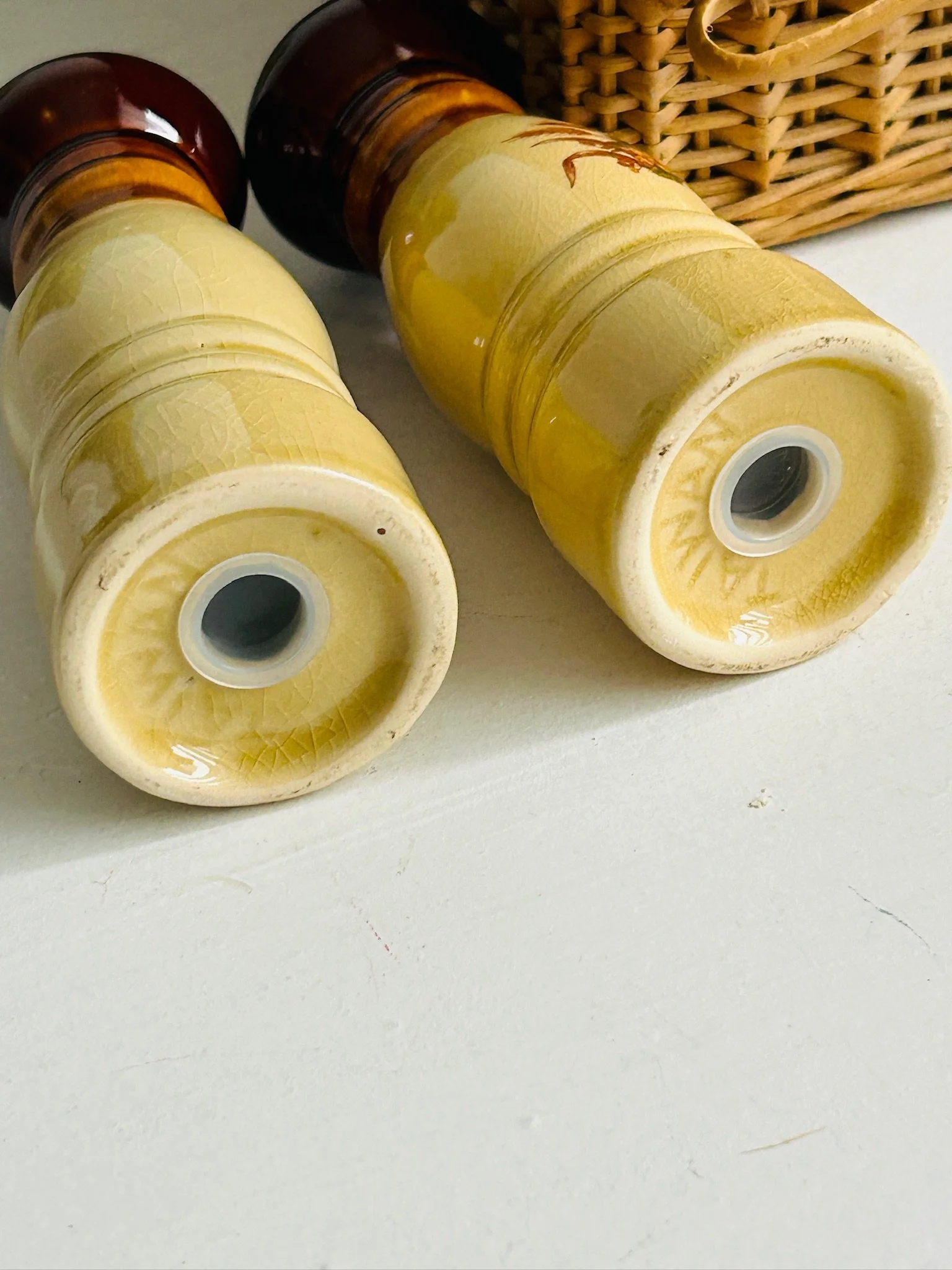 Underside view of the shaker bases showing the fill openings