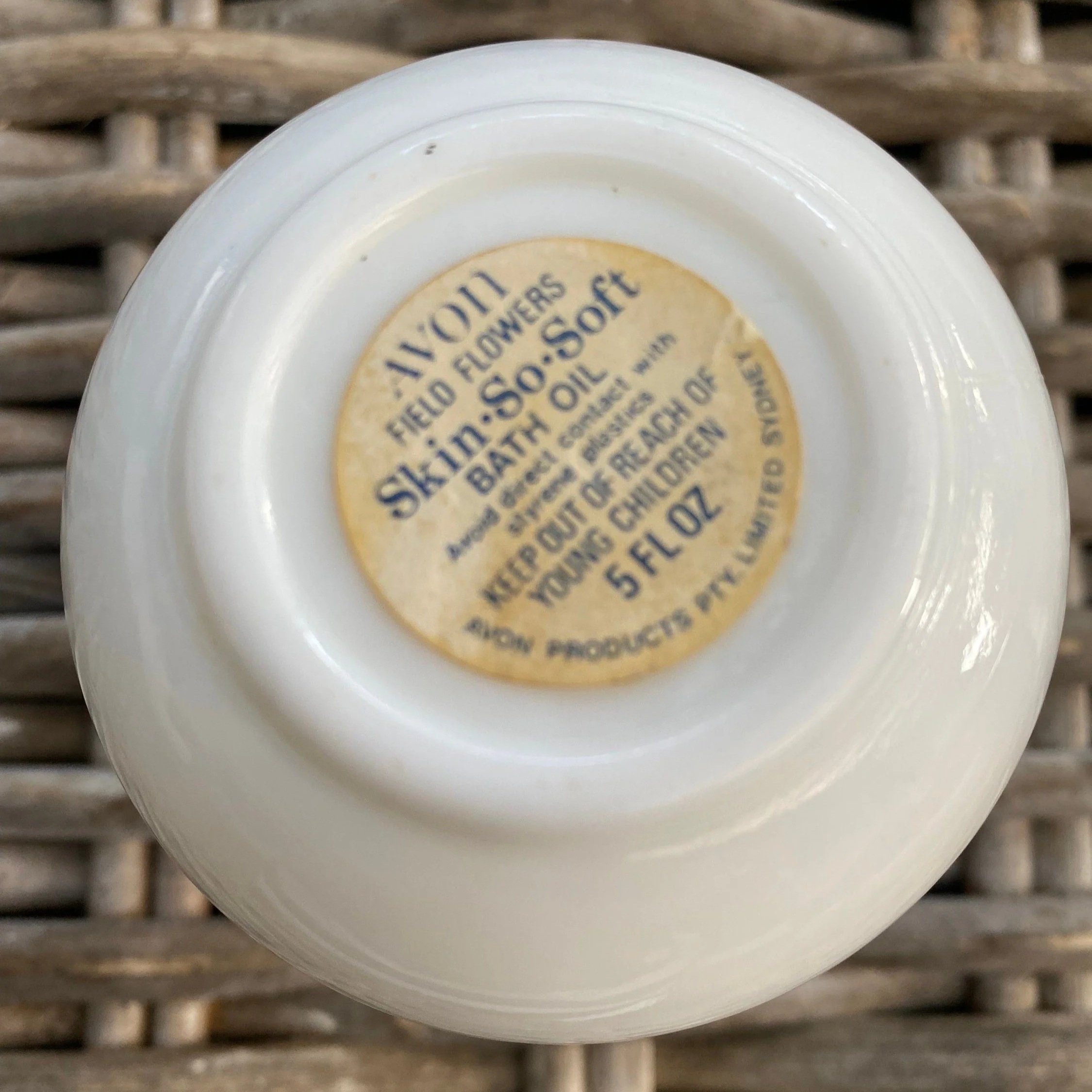 Underside showing original ‘Skin So Soft Bath Oil’ label from Avon