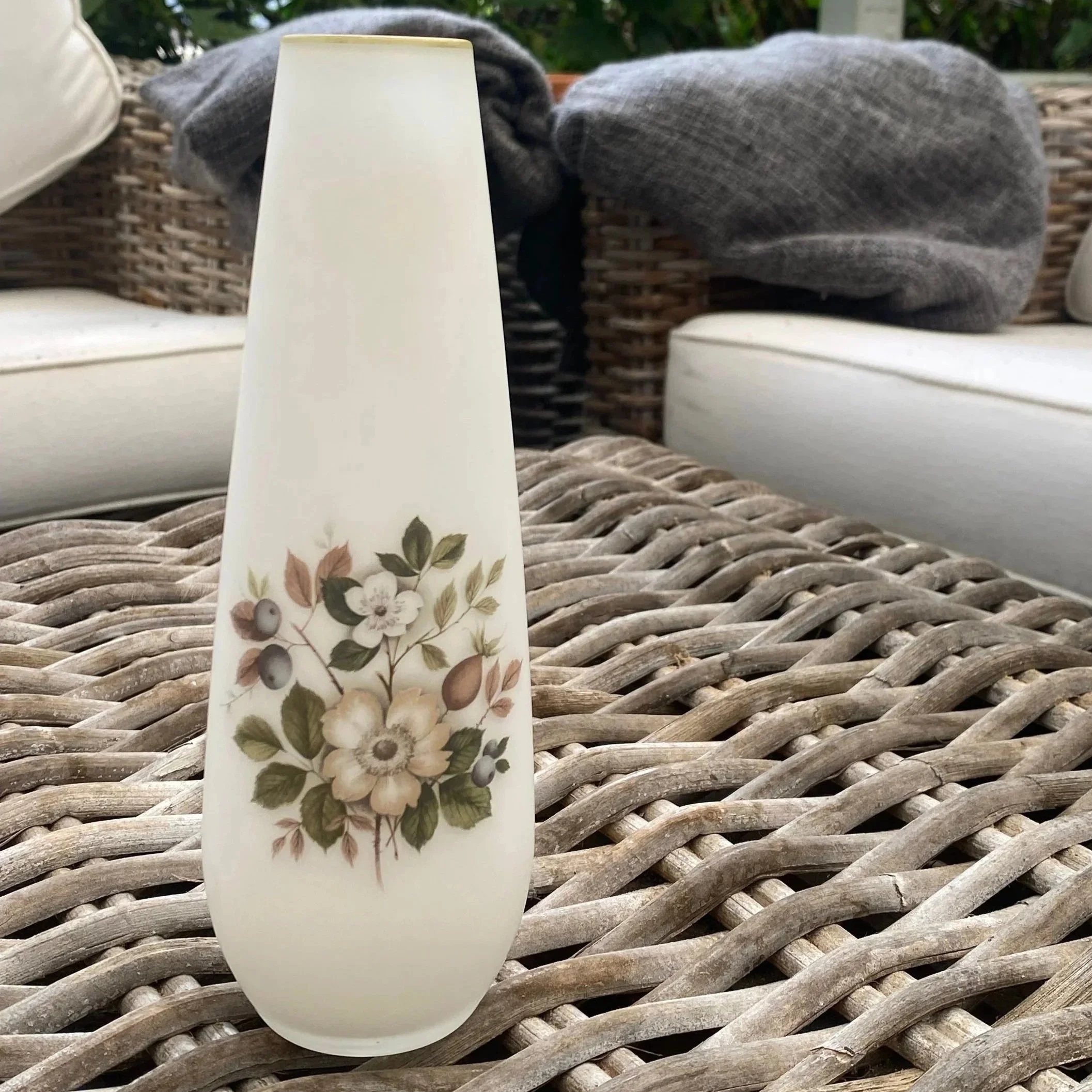 Full front view of vase showing floral motif on satin frosted glass