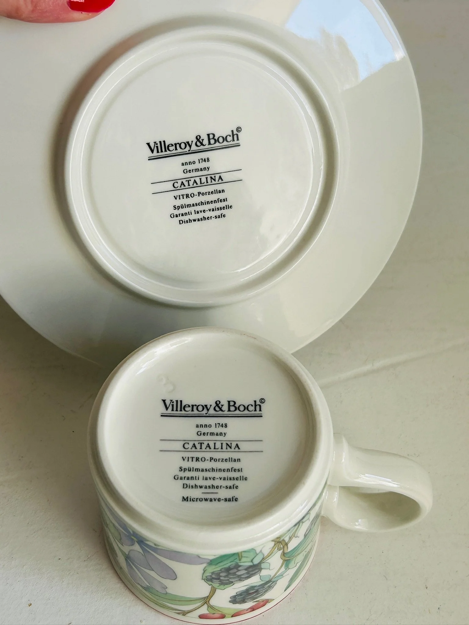 Underside view of the cup and saucer showing the Villeroy & Boch Catalina maker’s mark and backstamp details.