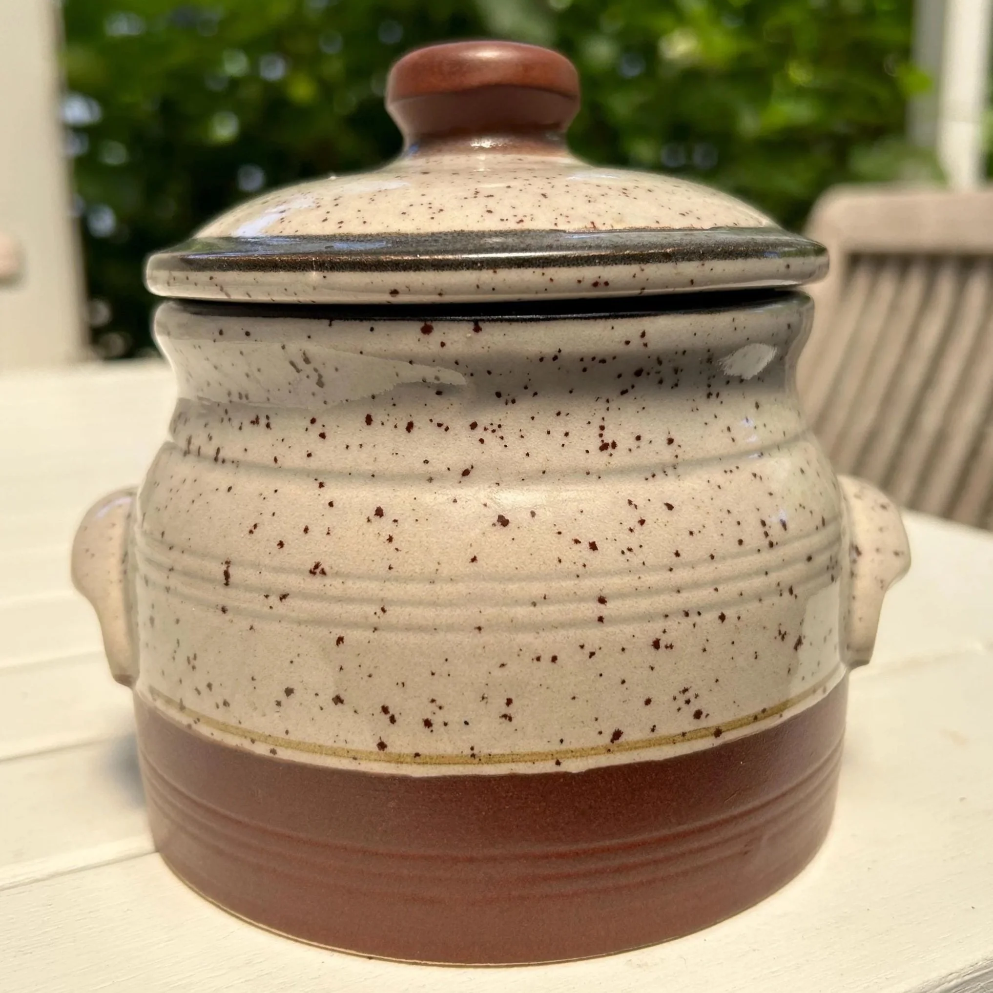 Front view of Korean stoneware pot with lid
