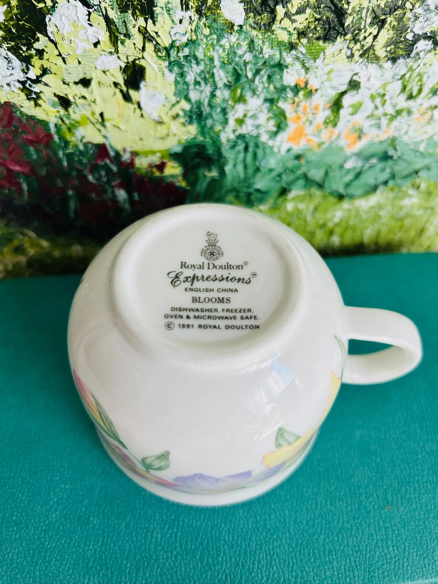 Underside of the teacup showing the Royal Doulton Expressions Blooms backstamp and maker’s mark