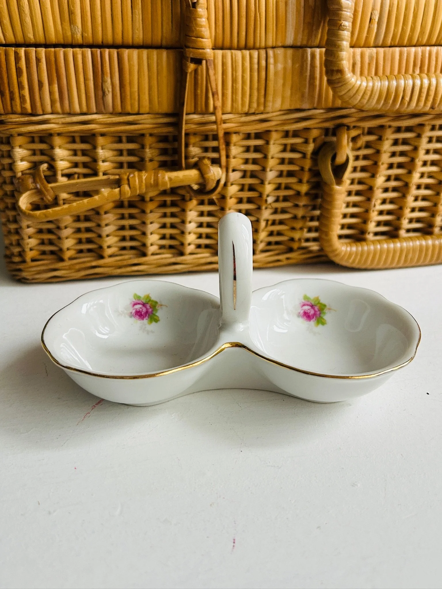 Front view of vintage MZ Czechoslovakia porcelain double salt cellar with pink rose floral design and gold trim