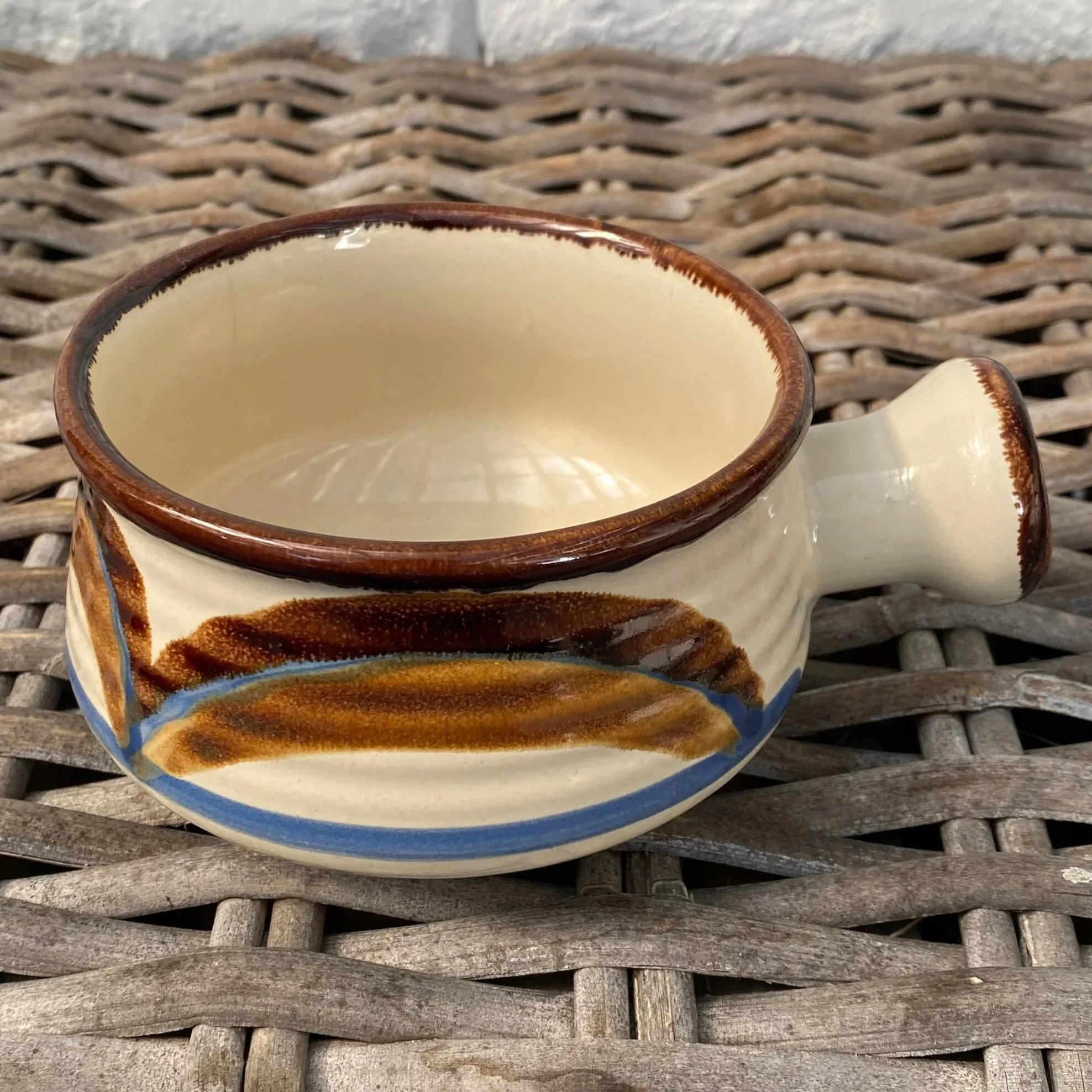 Opposite side view of Tramore stoneware bowl with handle and retro brushstroke pattern