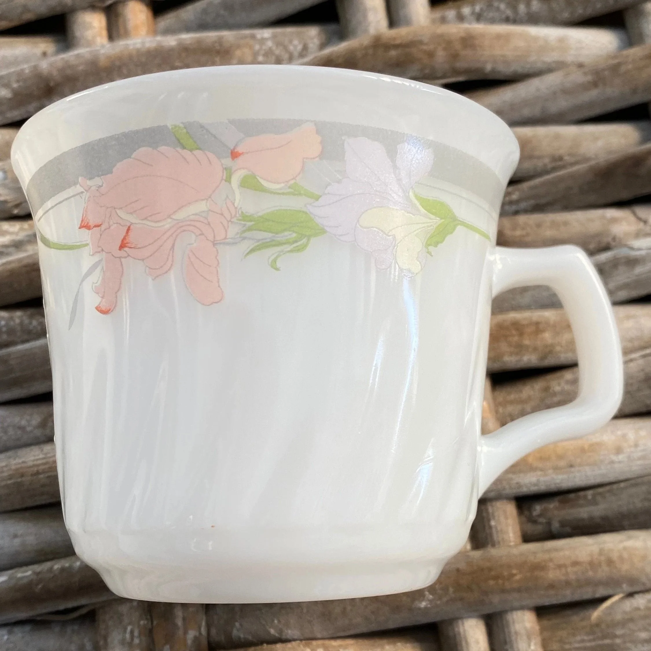 Saucer only with visible floral and scalloped edge