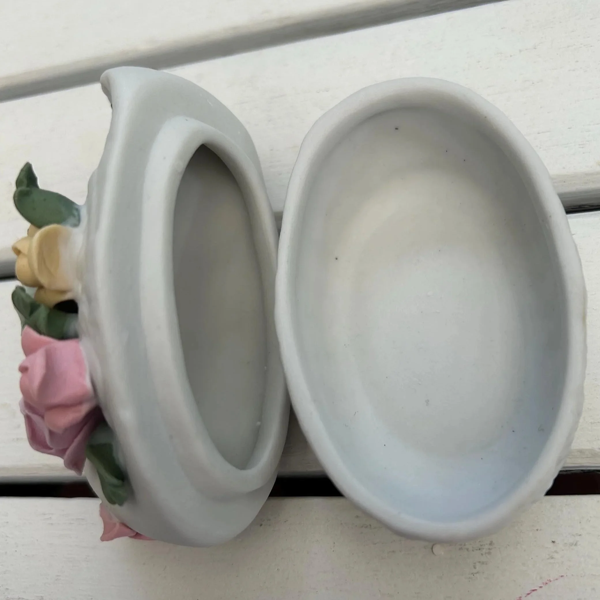 Open view of both parts of the box, showing interior