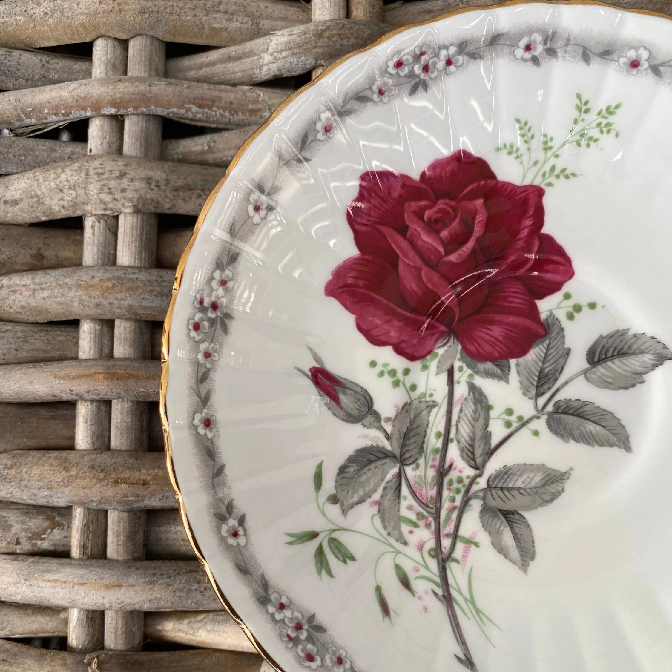 Detail of rose design showing vivid red and fine brushwork