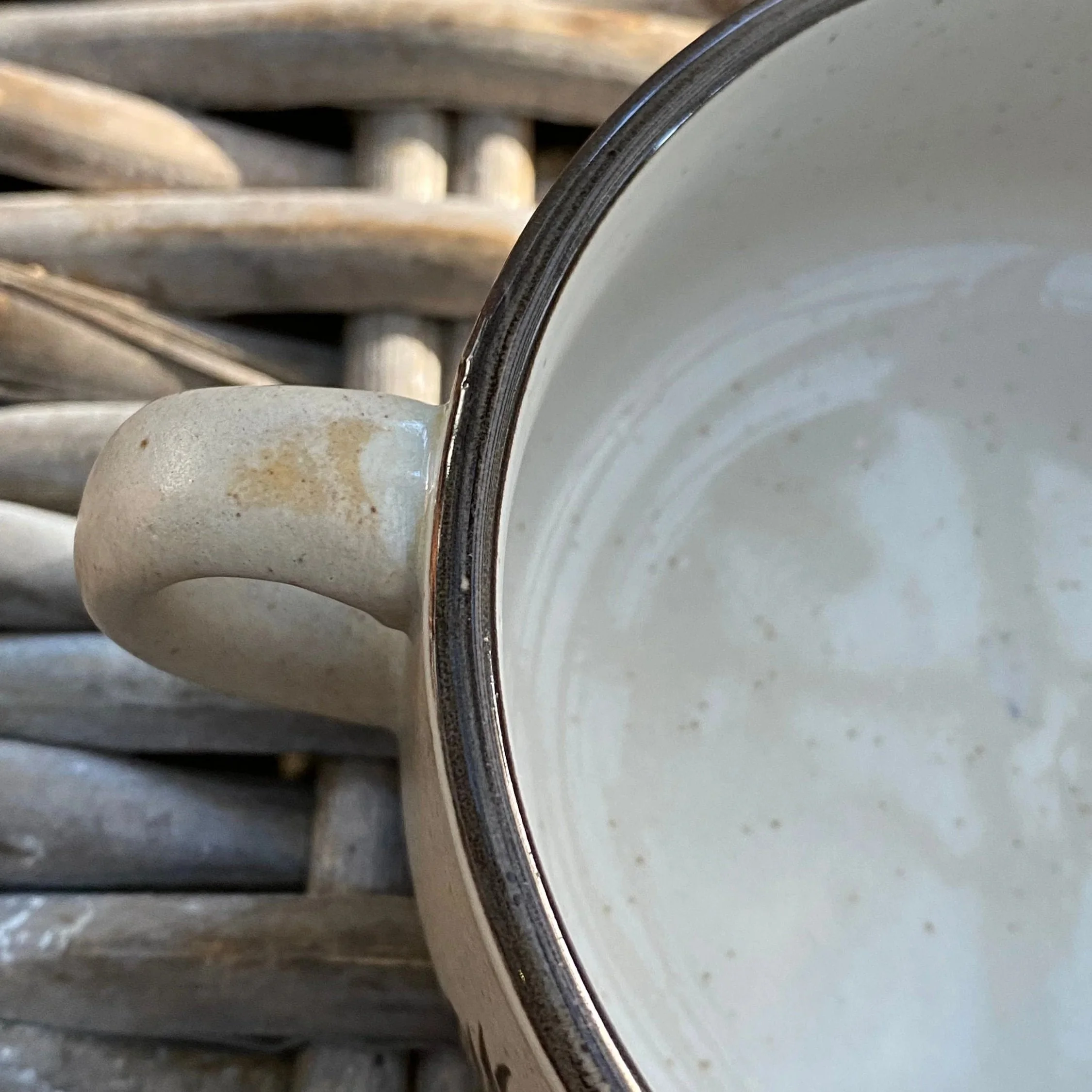 Close-up of inner rim and handle with visible glaze mark