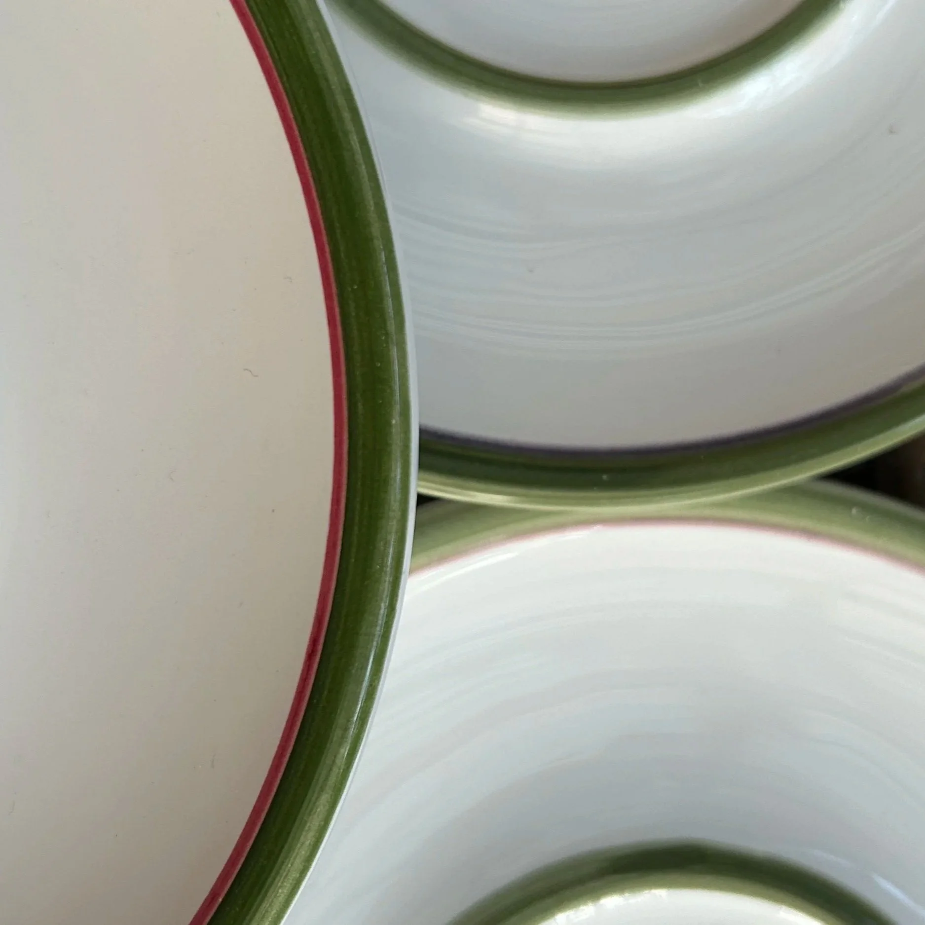 Layered plate stack highlighting colour variation (brown, red, purple)