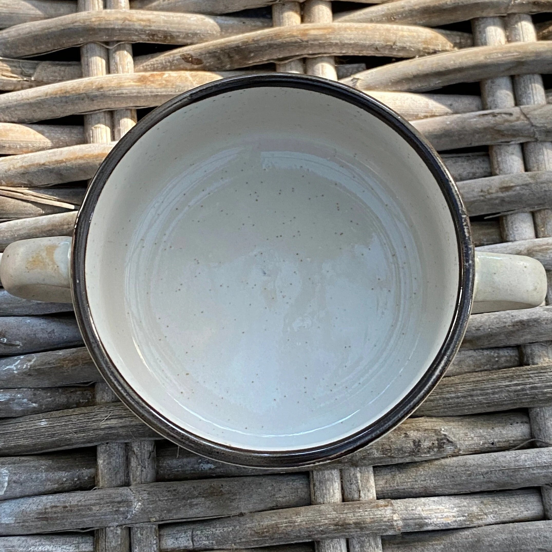 Top-down view of mug interior with clean white glaze