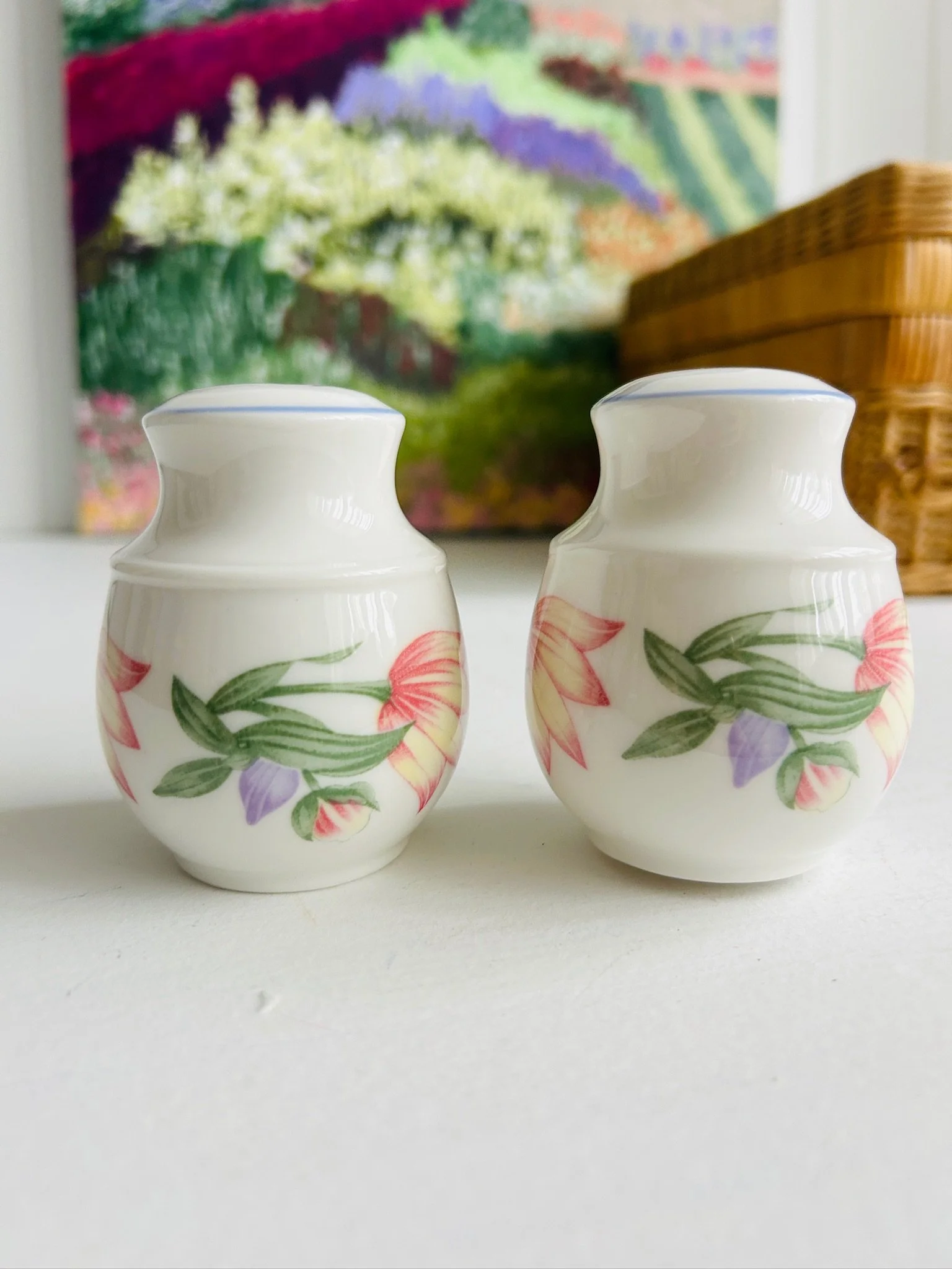 Rear view of the pair standing upright, showing the continuation of the floral pattern on the back