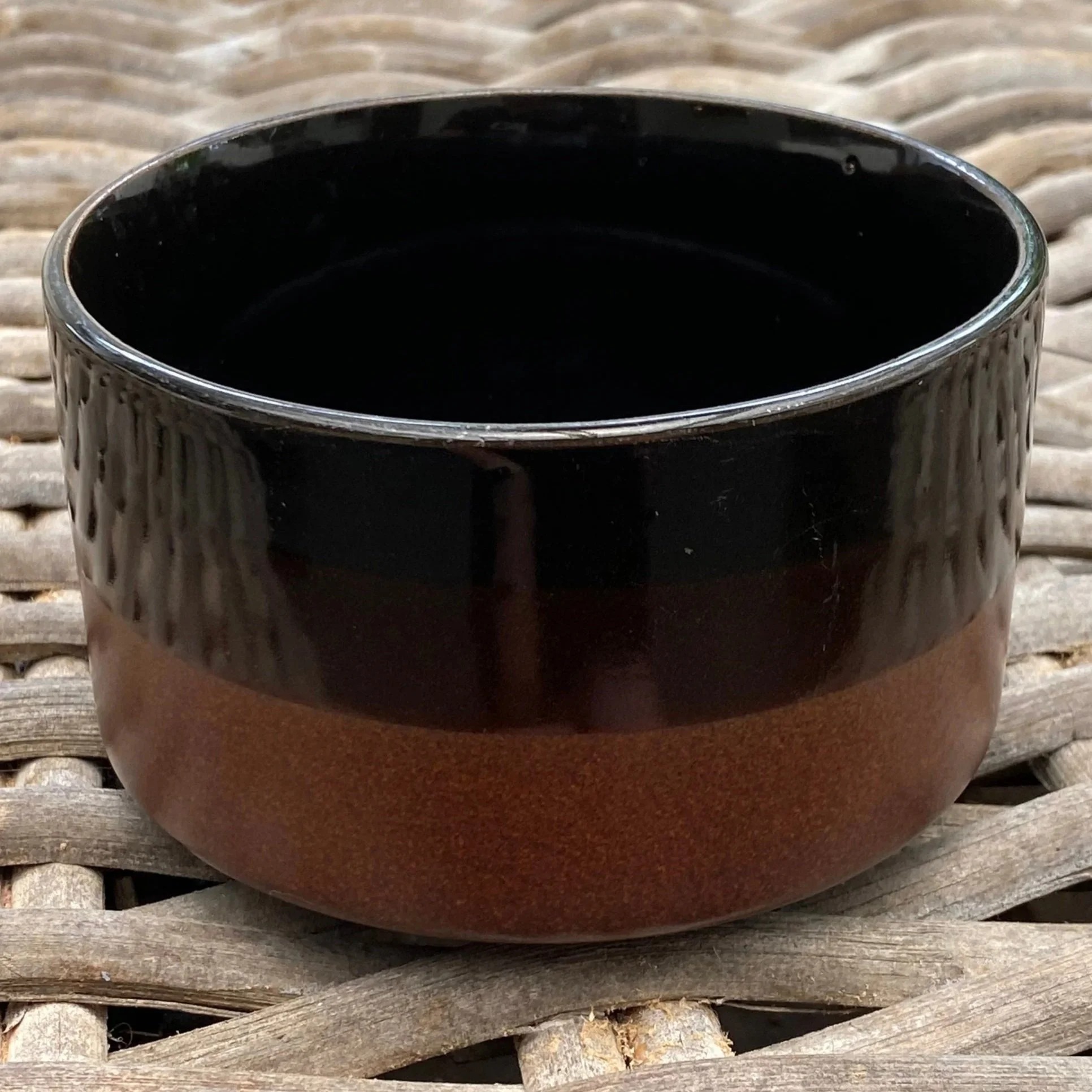 Front view highlighting wide shape and two-tone glaze