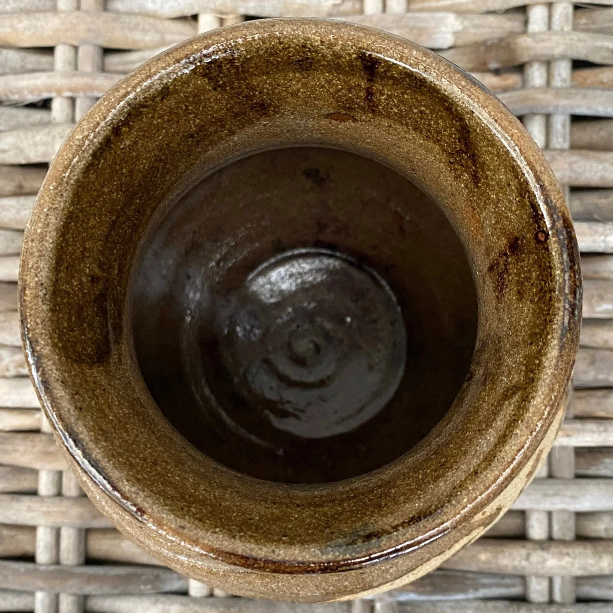 Top-down view of interior showing deep brown glazed surface