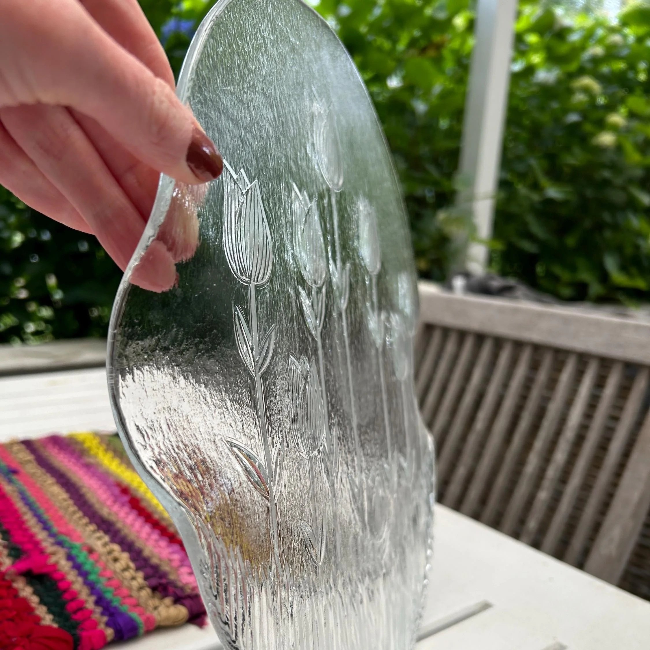 Angled standing view of platter showing organic shape.
