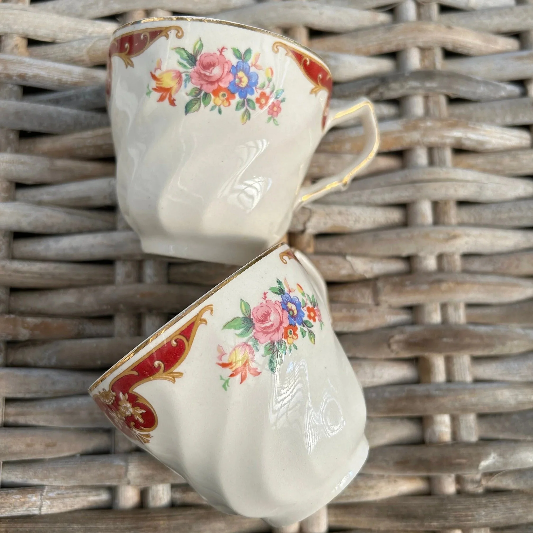 Two stacked teacups highlighting pattern symmetry and fluted shape