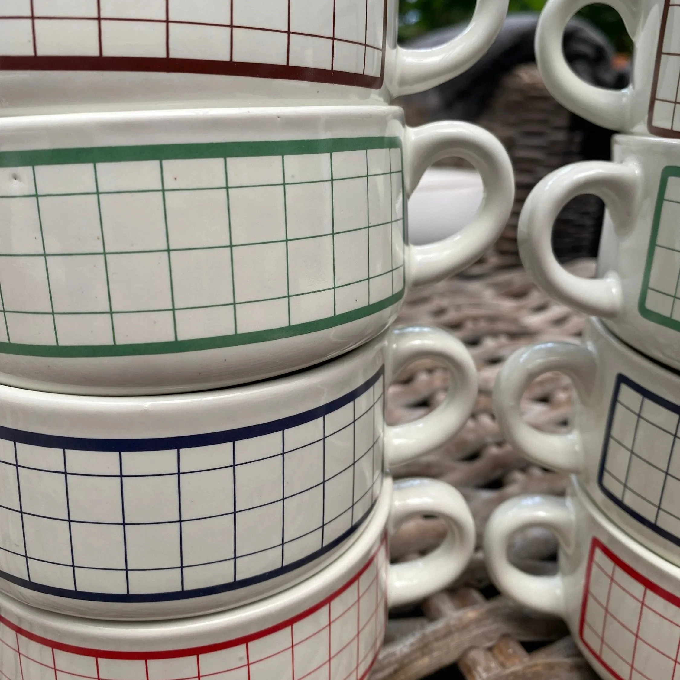 Stacked grid pattern soup mugs showing assorted colour bands