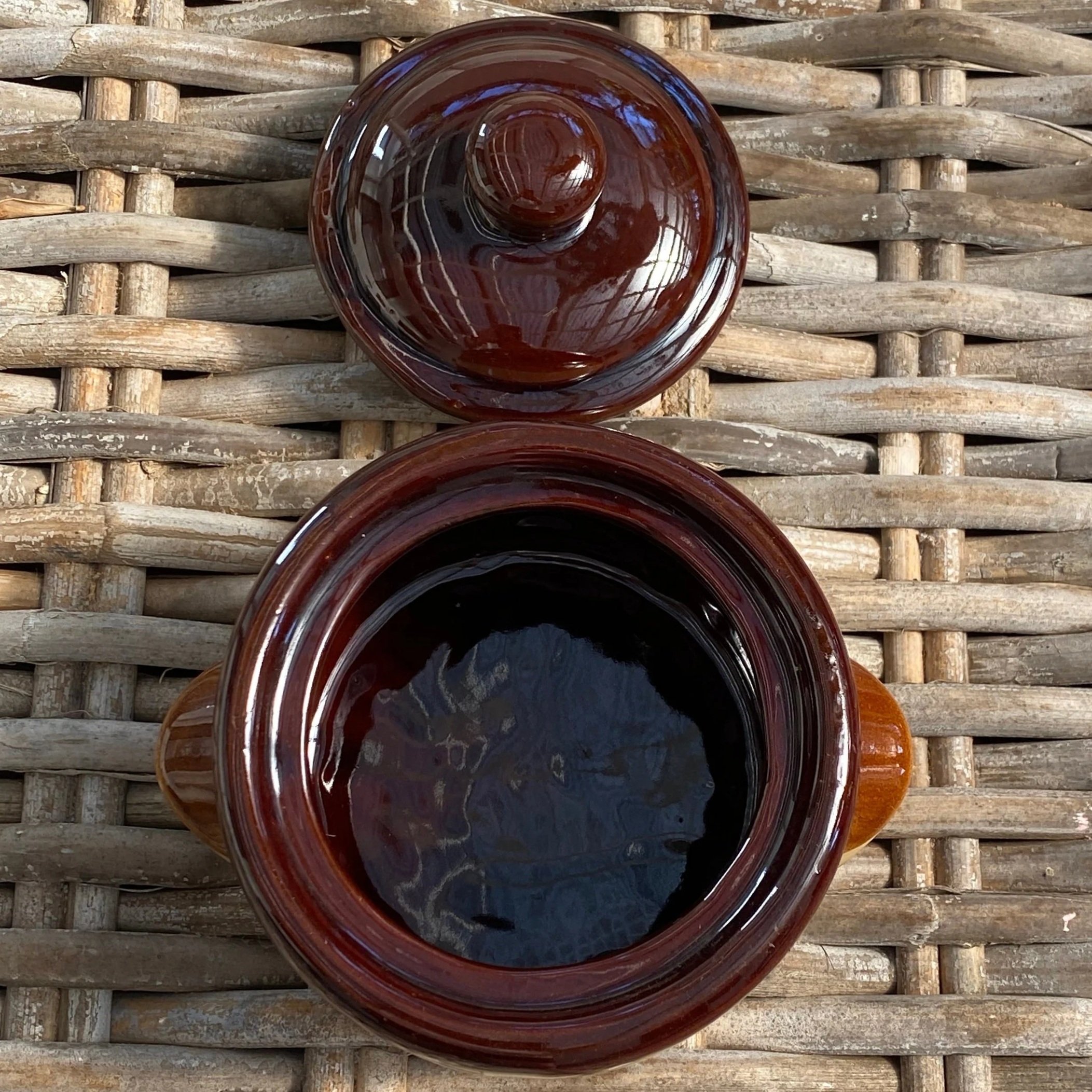 Open view of individual ramekin showing glossy interior