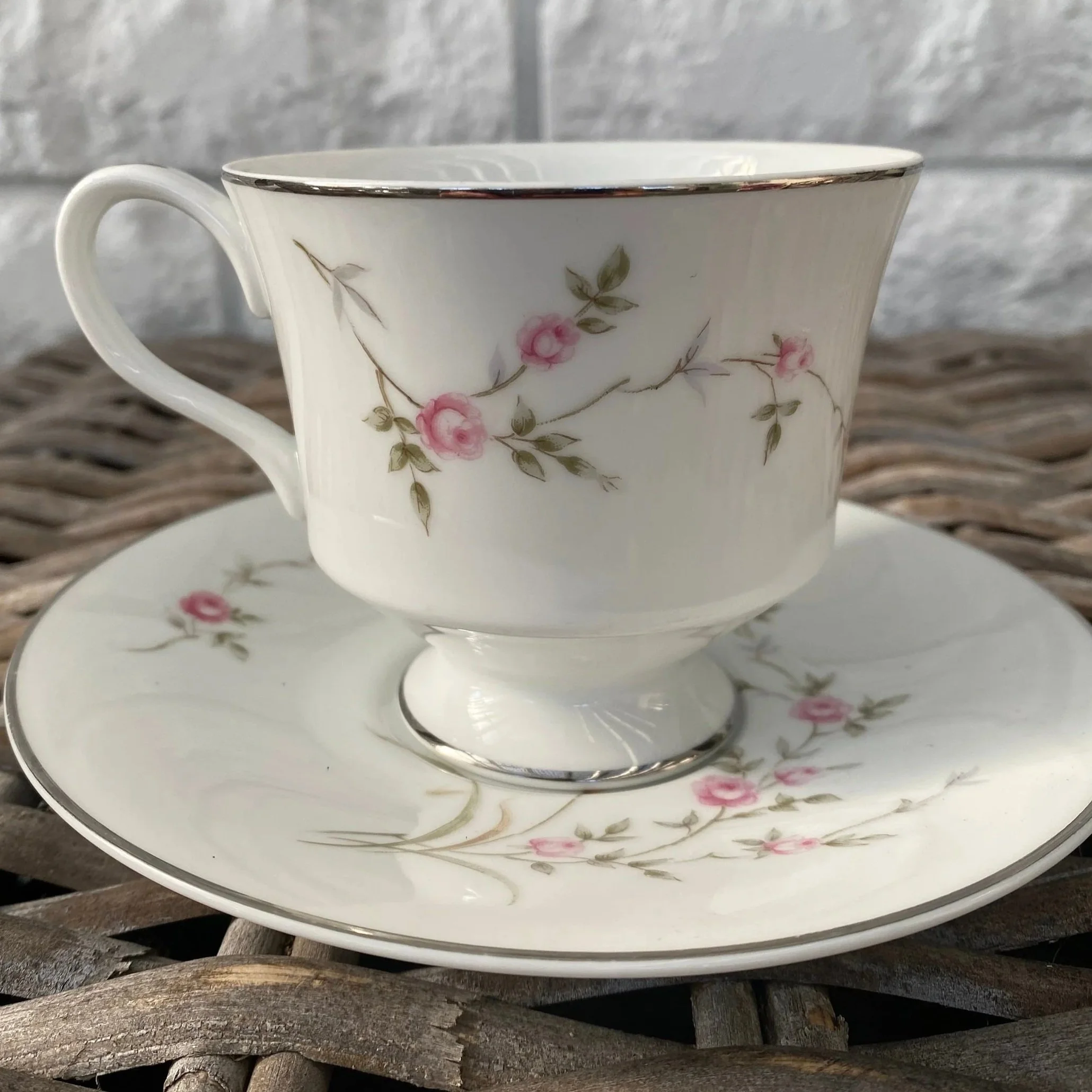 Side profile of teacup and saucer together