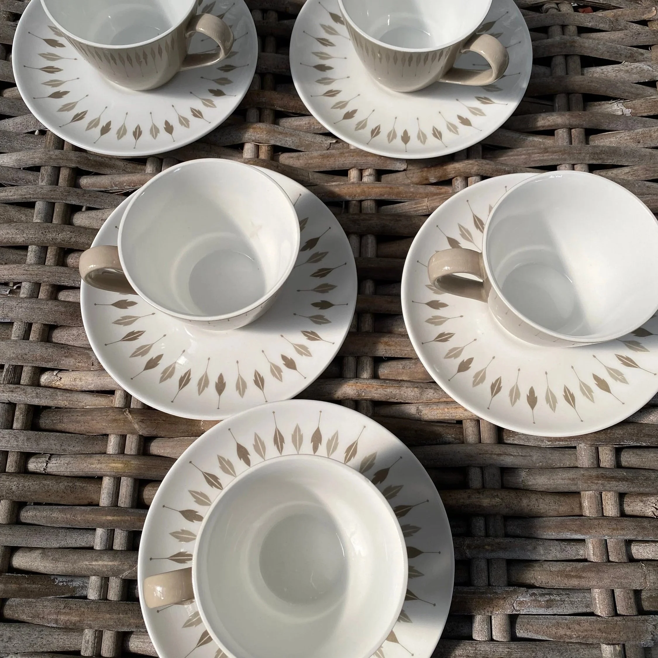 Top view of complete set arranged on rustic wicker background