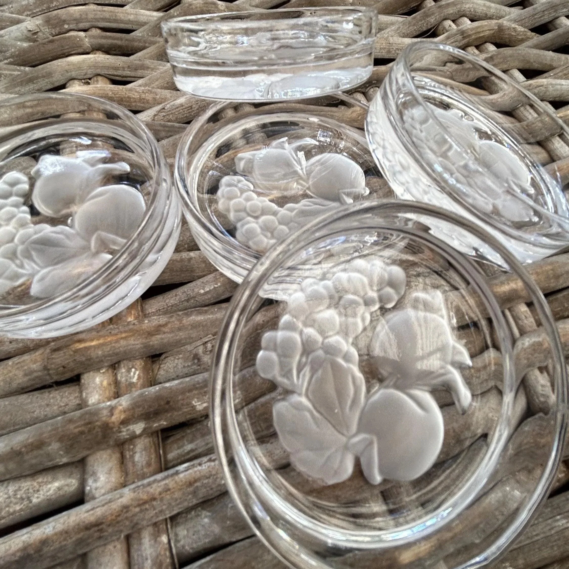 Group shot of all 5 coasters stacked and slightly fanned out