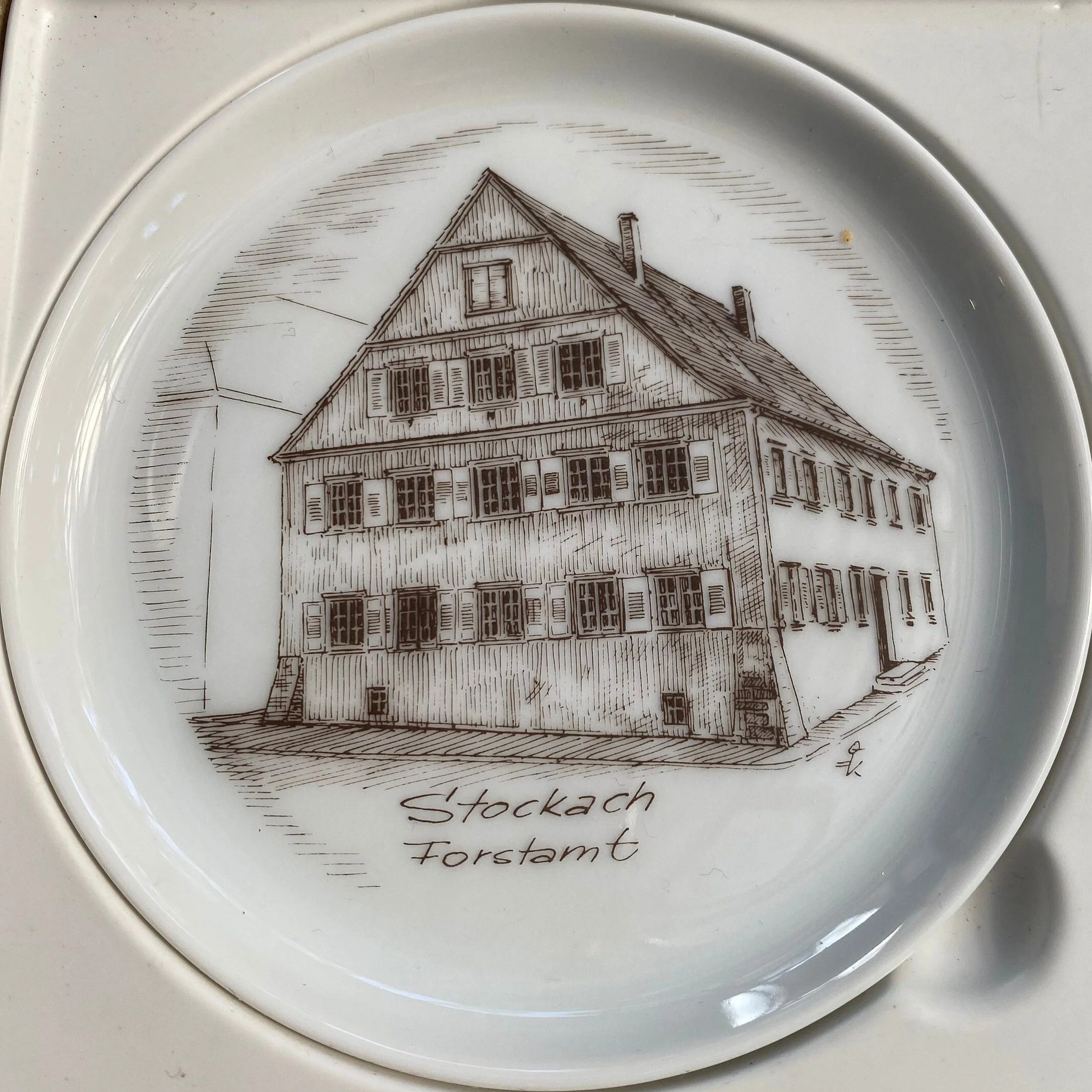 Close-up of Stockach “Toramt” plate with brown architectural design