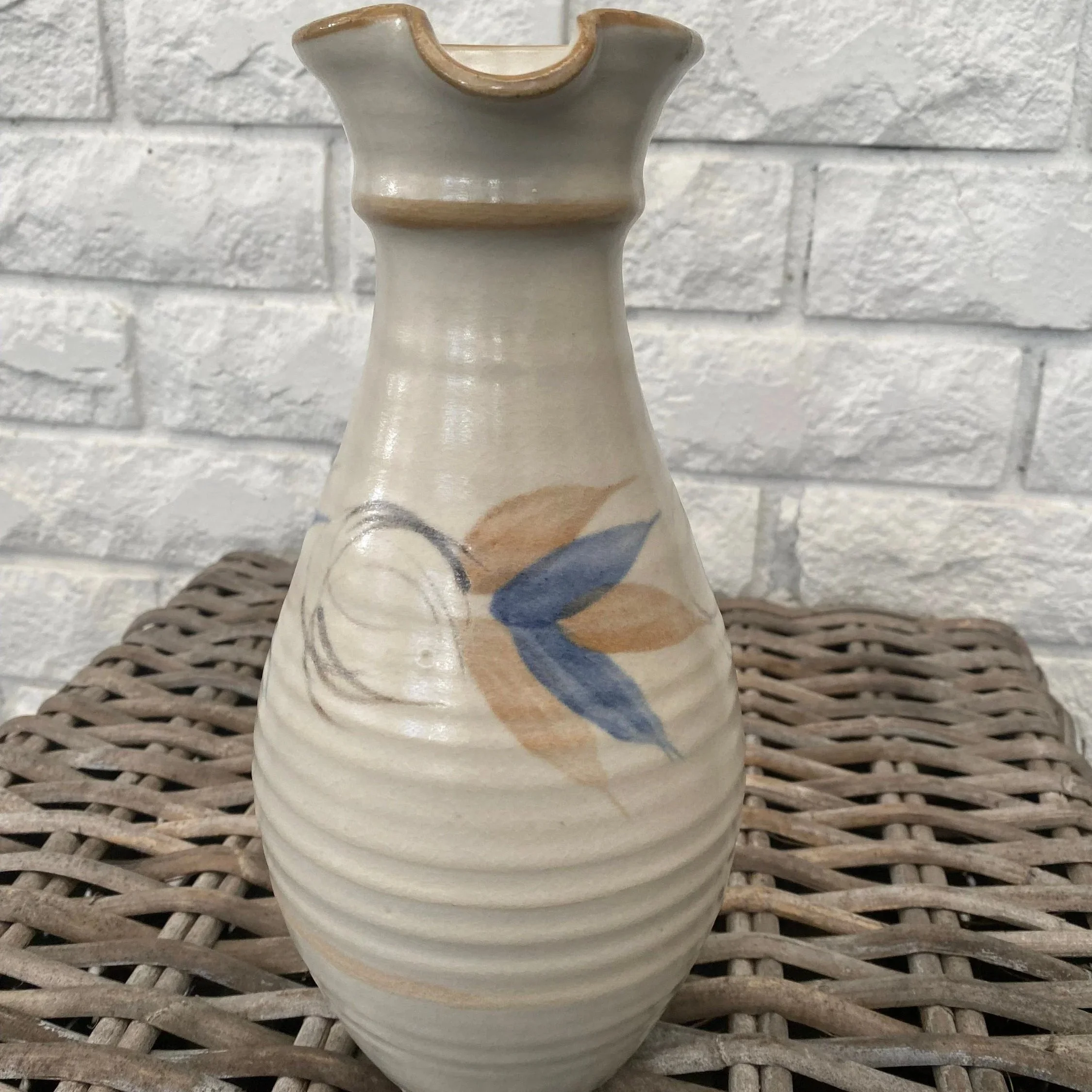 Full front view of Ettamogah ceramic jug with hand-painted motif