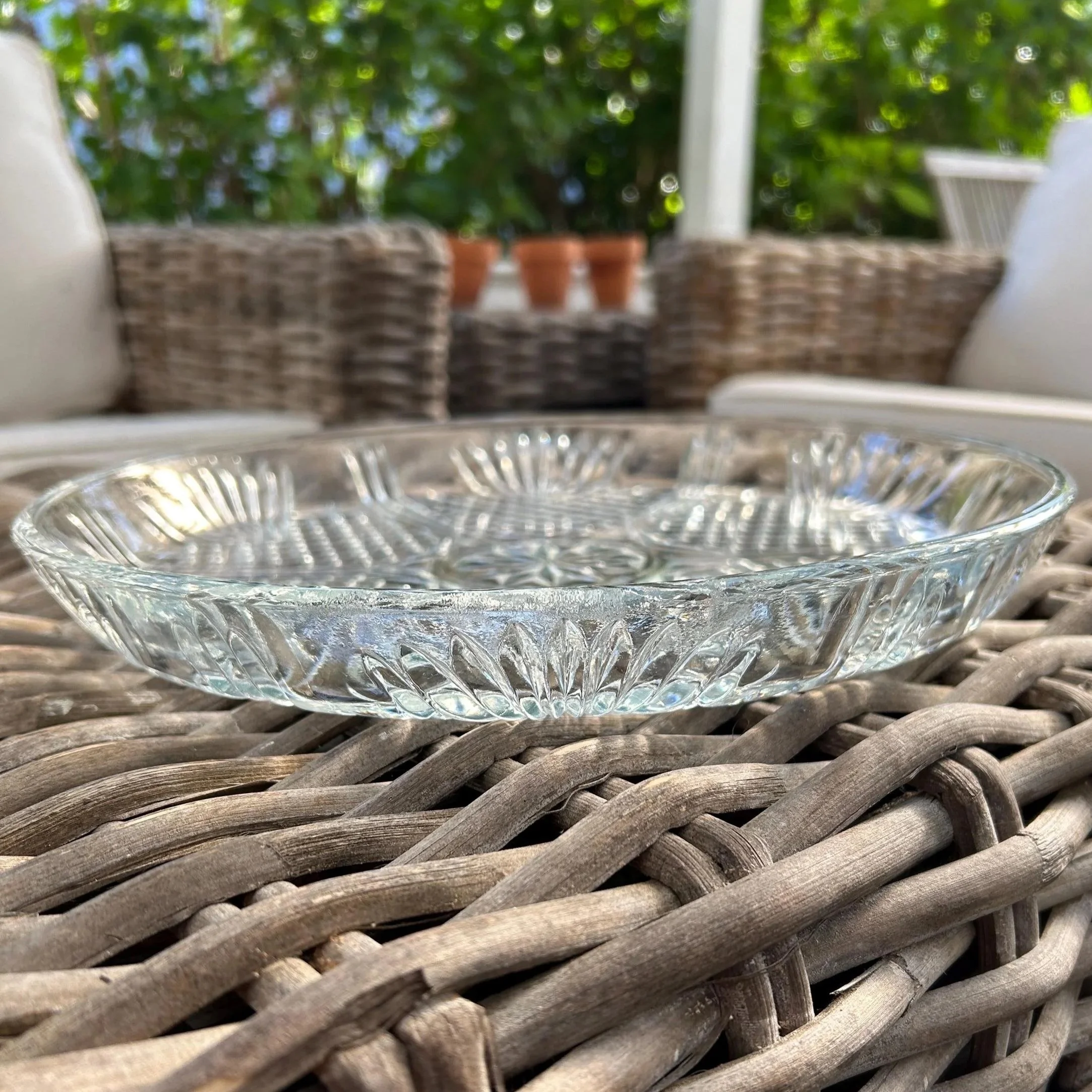 Side profile of heavy crystal platter showing high rim.