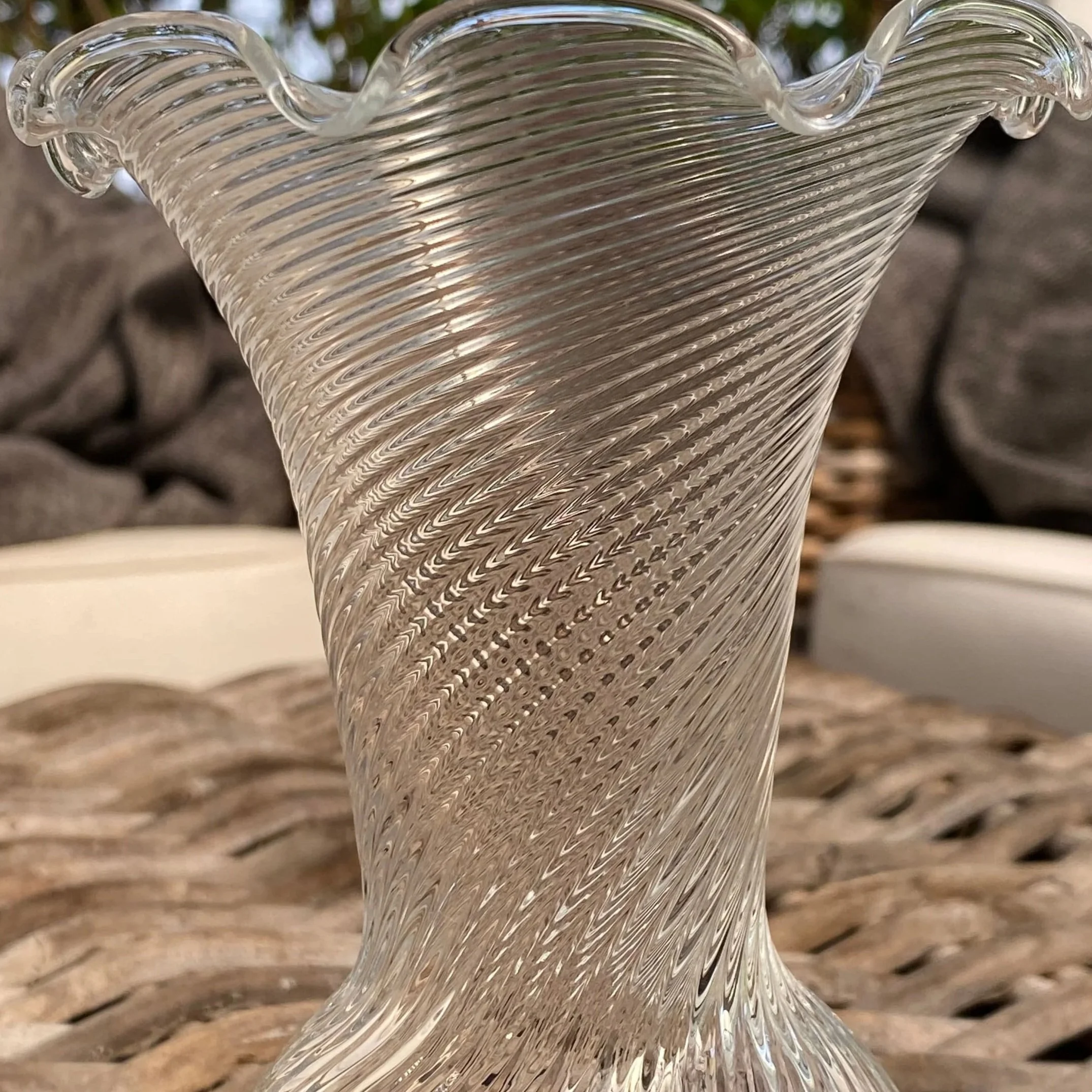 Detail of swirling texture on midsection of mouth-blown glass vase