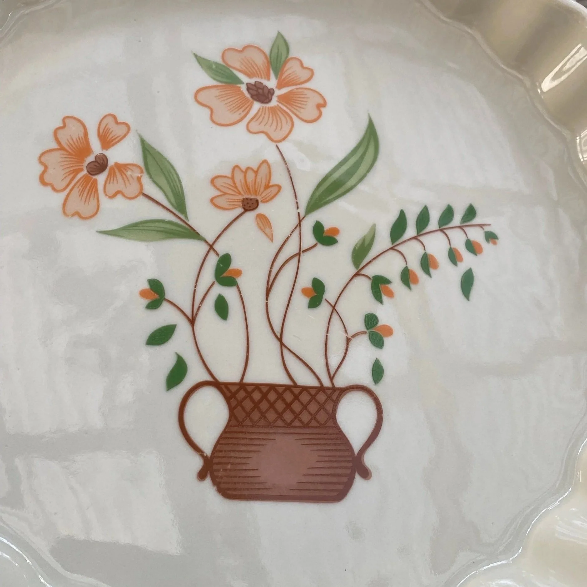Floral motif featuring terracotta jug and hand-drawn flower details