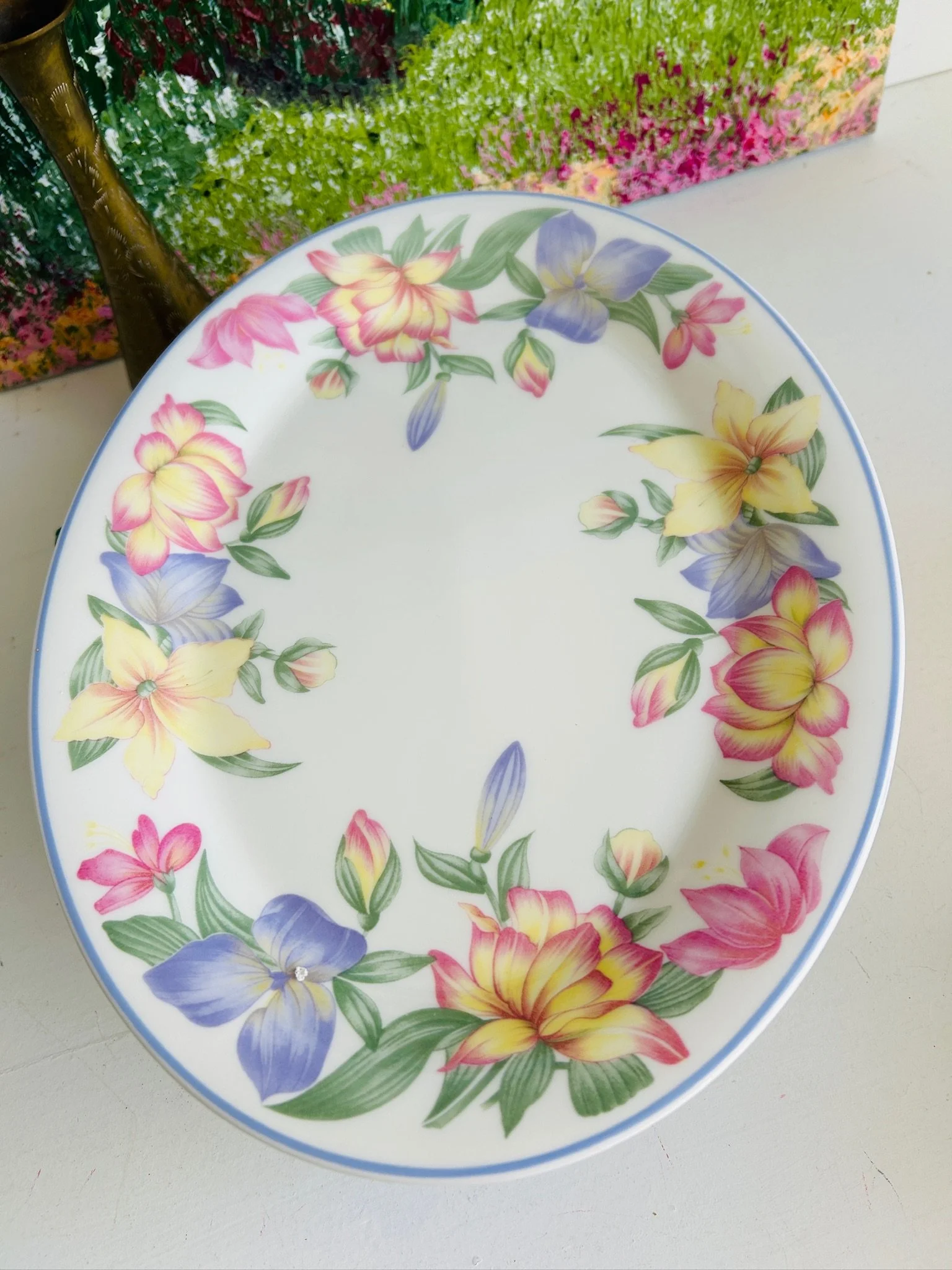 Angled top view of the Royal Doulton Blooms platter, showing the oval shape, floral rim, and wide serving surface