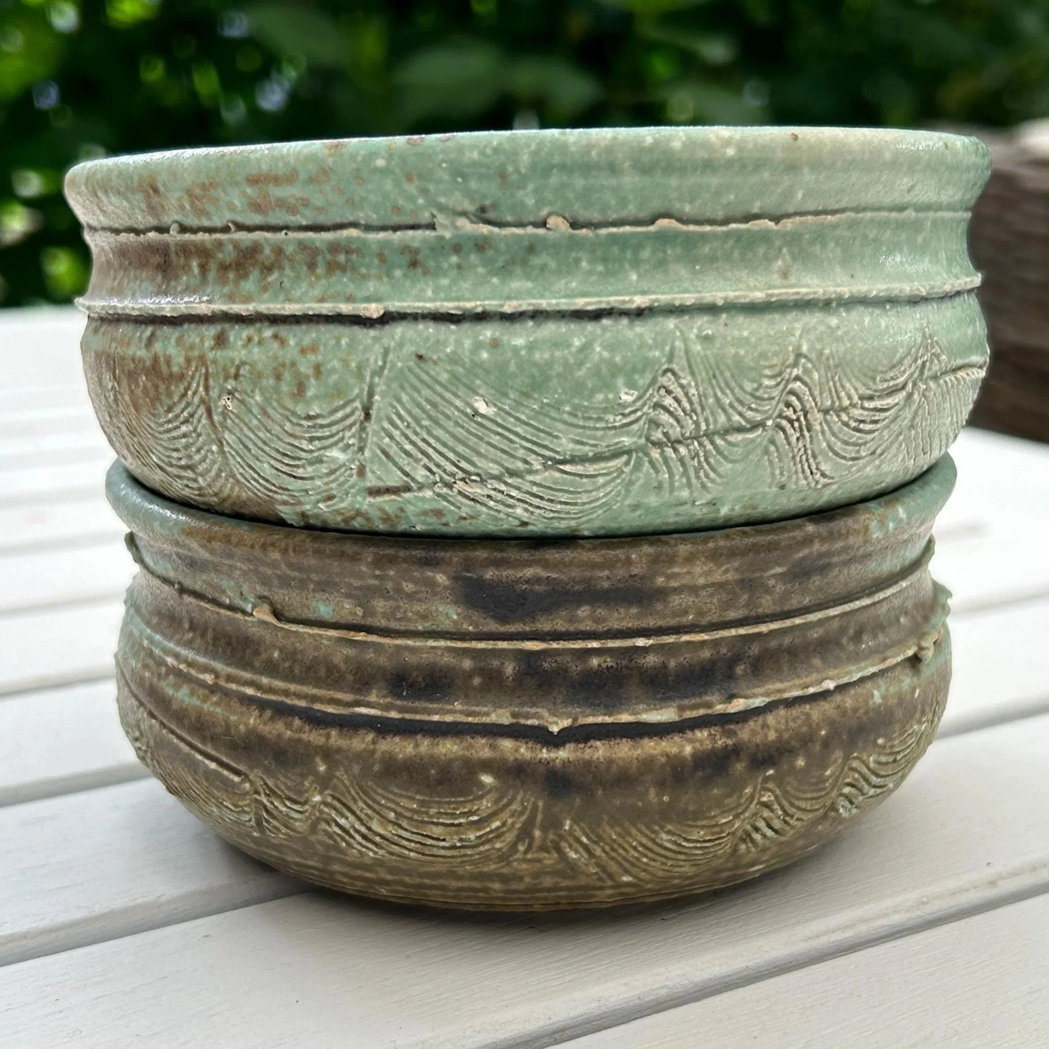 Stacked side profile view highlighting exterior texture and glaze layers