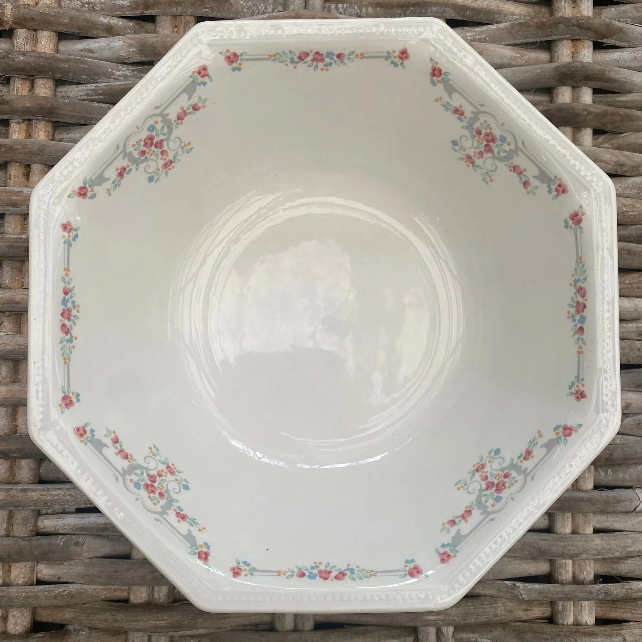 Overhead view showing octagonal bowl shape and full floral border