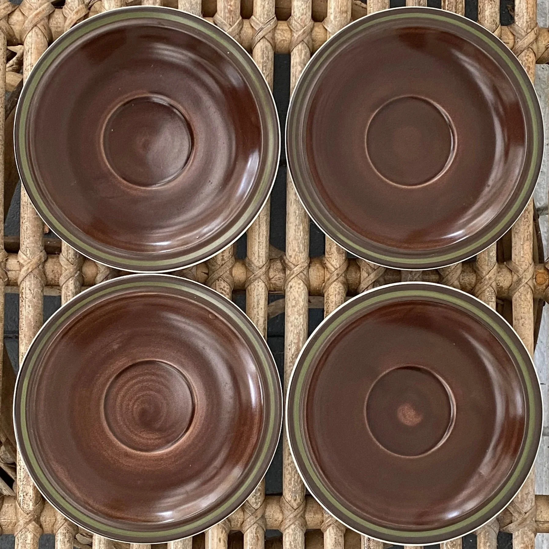 Grouped image of 4 saucers showing uniform colour and finish