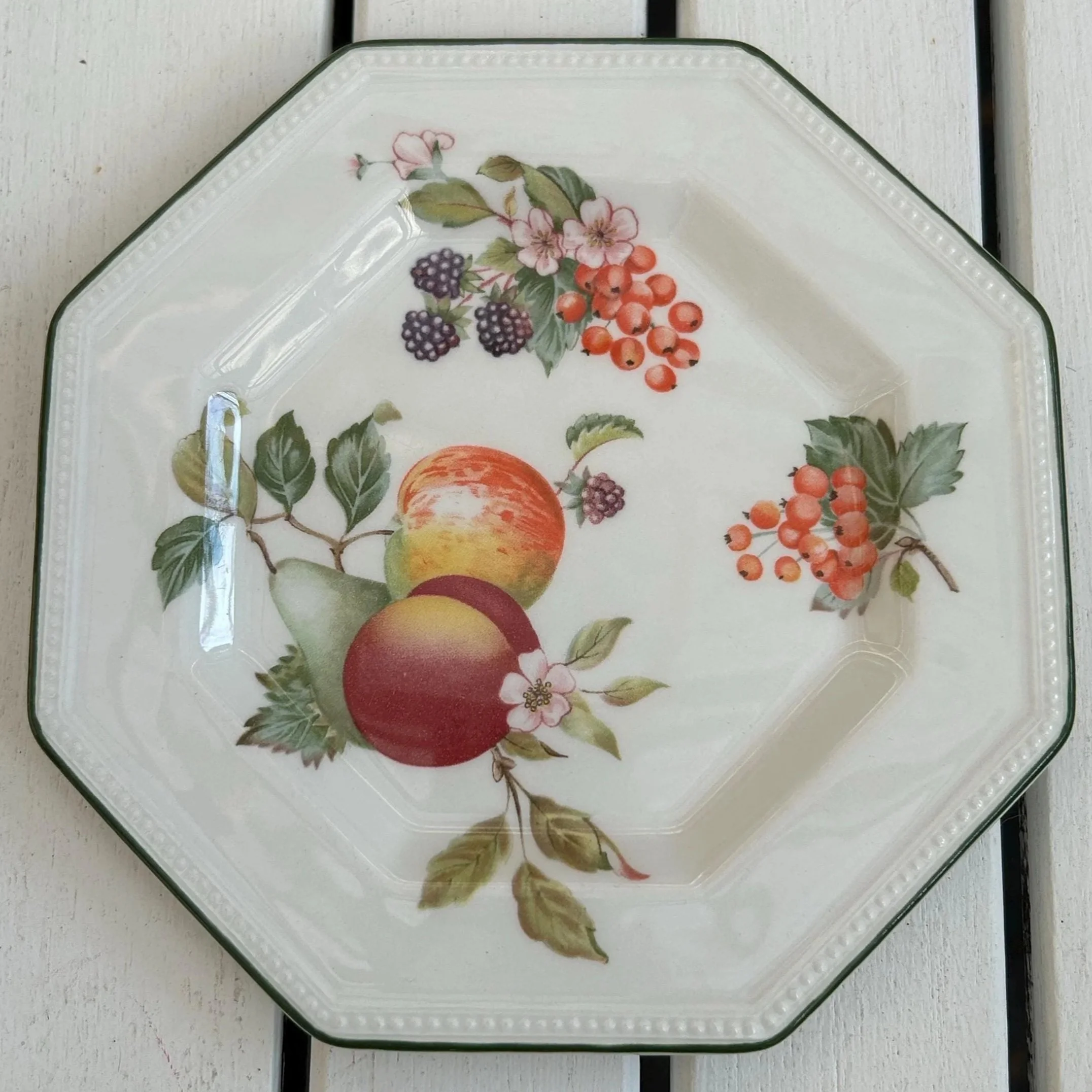 Full top-down view of Johnson Brothers Fresh Fruit side plate with vibrant fruit pattern