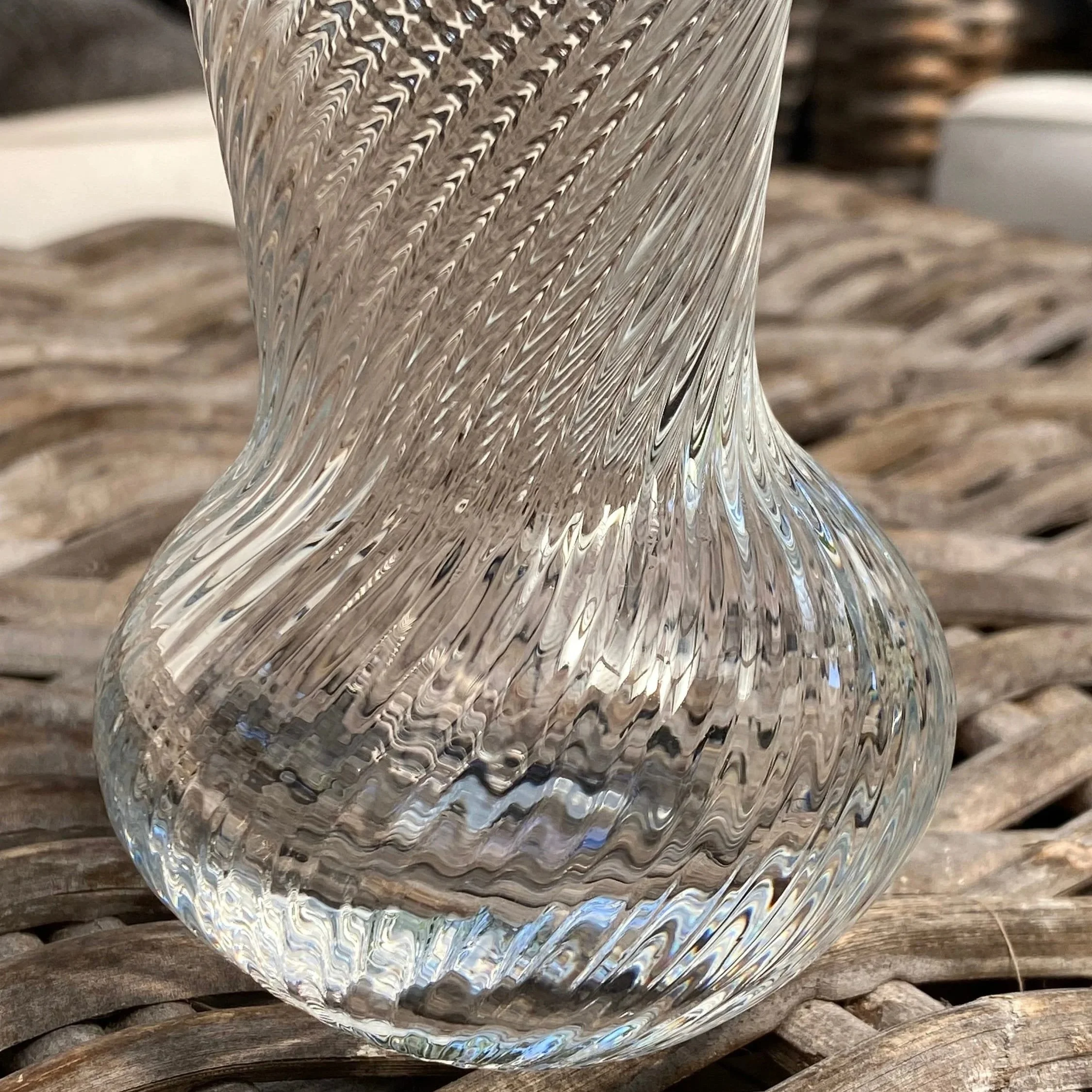 Close-up of vase base and lower bulb with spiral texture