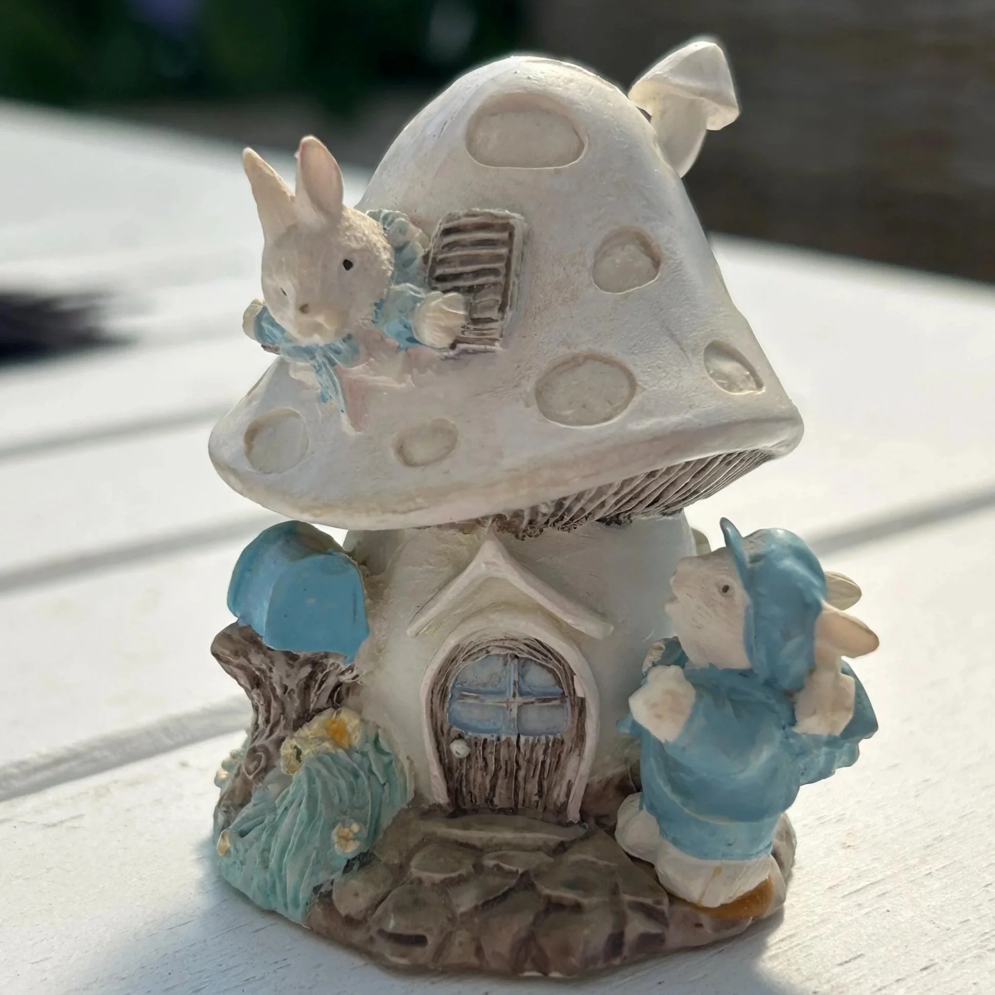Front view of Bunnyville mushroom house with two bunny characters